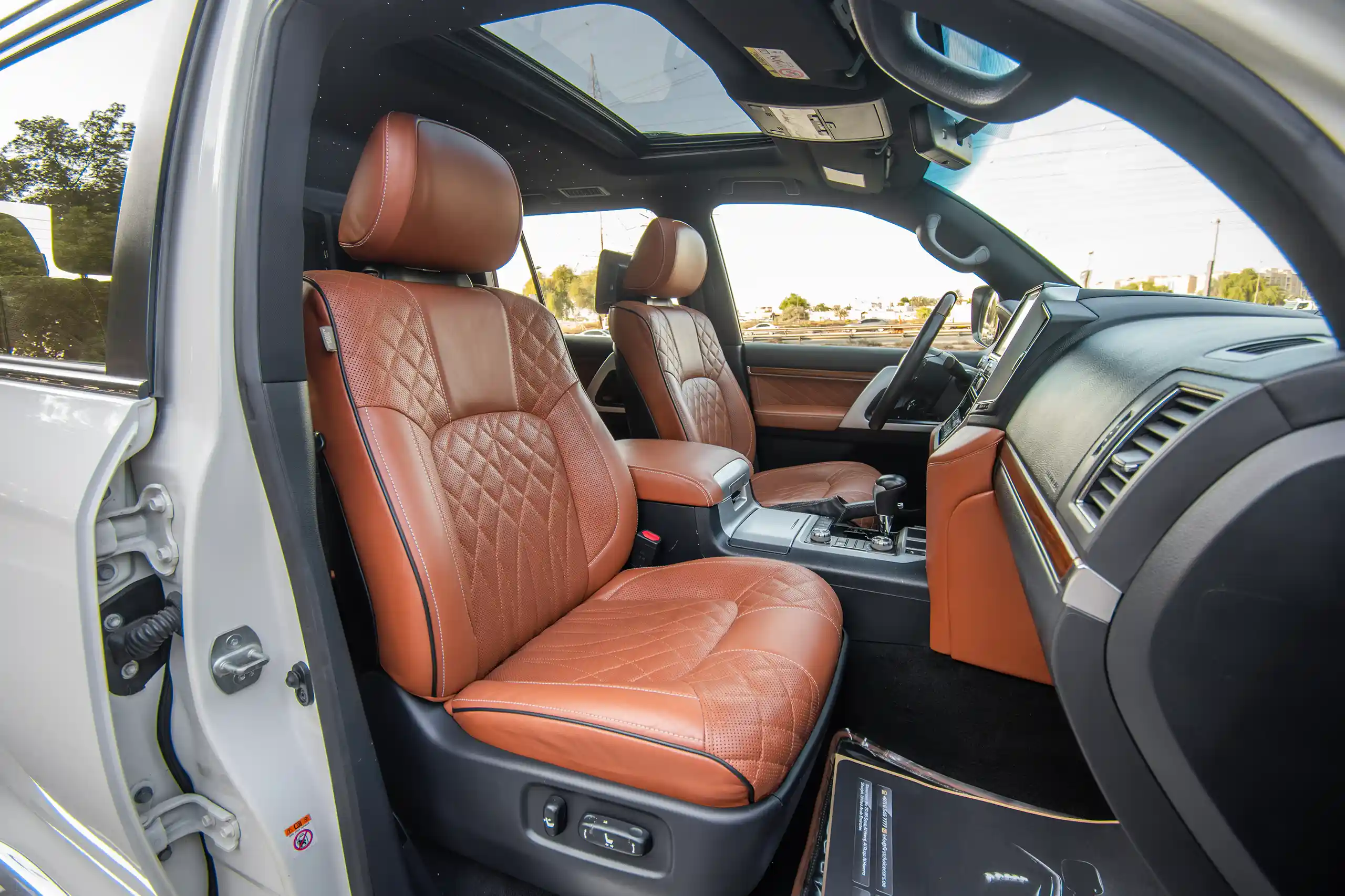 Used 2016 Toyota Land Cruiser Gxr 5.7L V8 White – Front Passenger Side Cabin View at First Choice Cars Sharjah