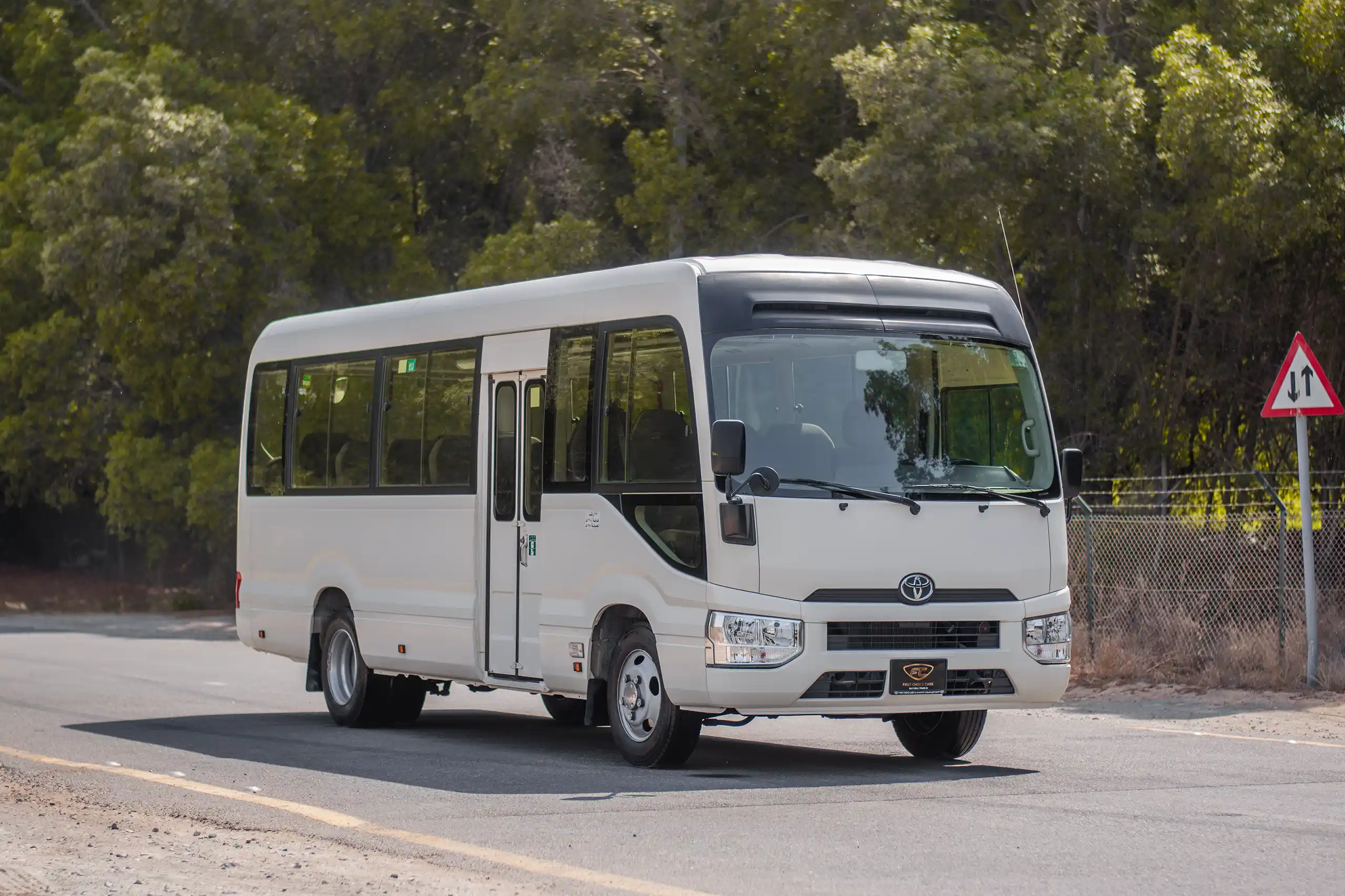 Used 2020 Toyota Coaster 22 STR Lwb 2.7L Petrol White – Right Front Diagonal (45°) View at First Choice Cars Sharjah