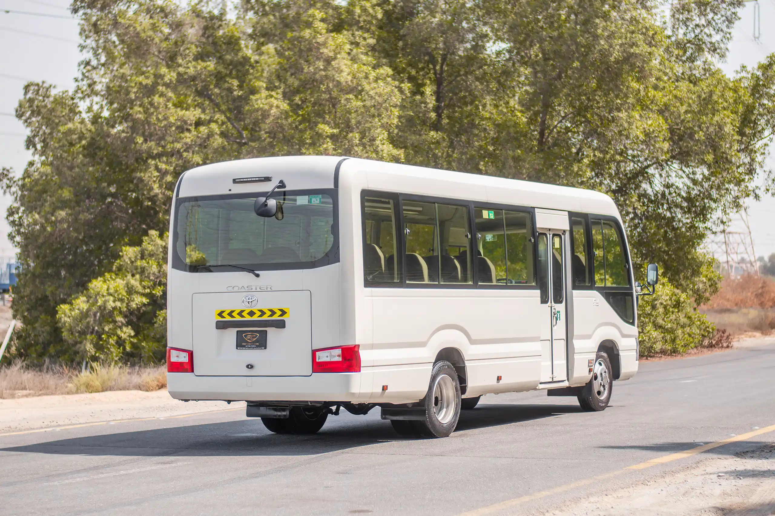 Used 2020 Toyota Coaster 22 STR Lwb 2.7L Petrol White – Right Back Diagonal (45°) View at First Choice Cars Sharjah