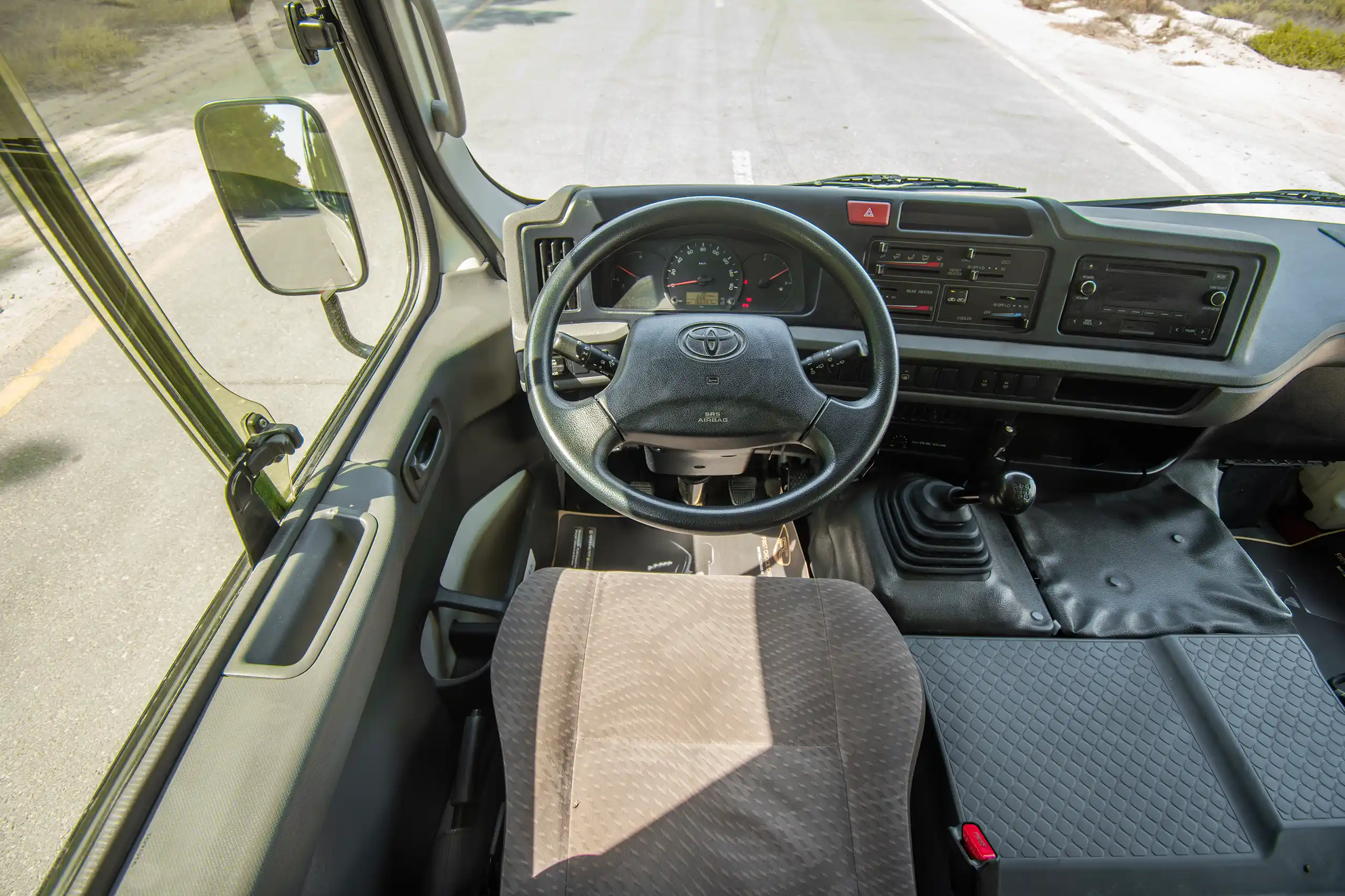 Used 2020 Toyota Coaster Bus White – Steering Wheel & Instrument Cluster at First Choice Cars Sharjah