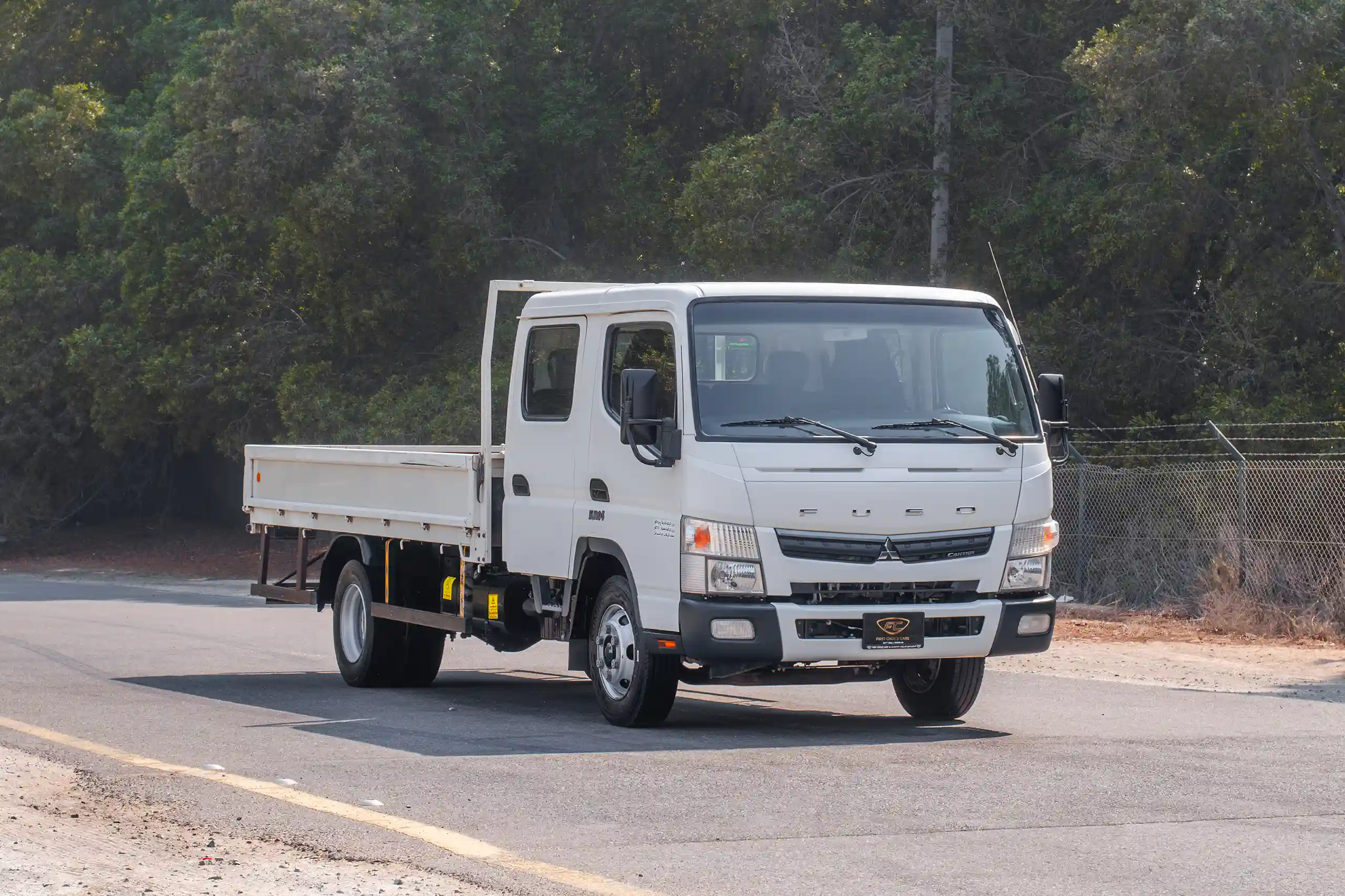 Used 2023 Mitsubishi Canter Double Cabin White – Right Front Diagonal (45°) View at First Choice Cars Sharjah