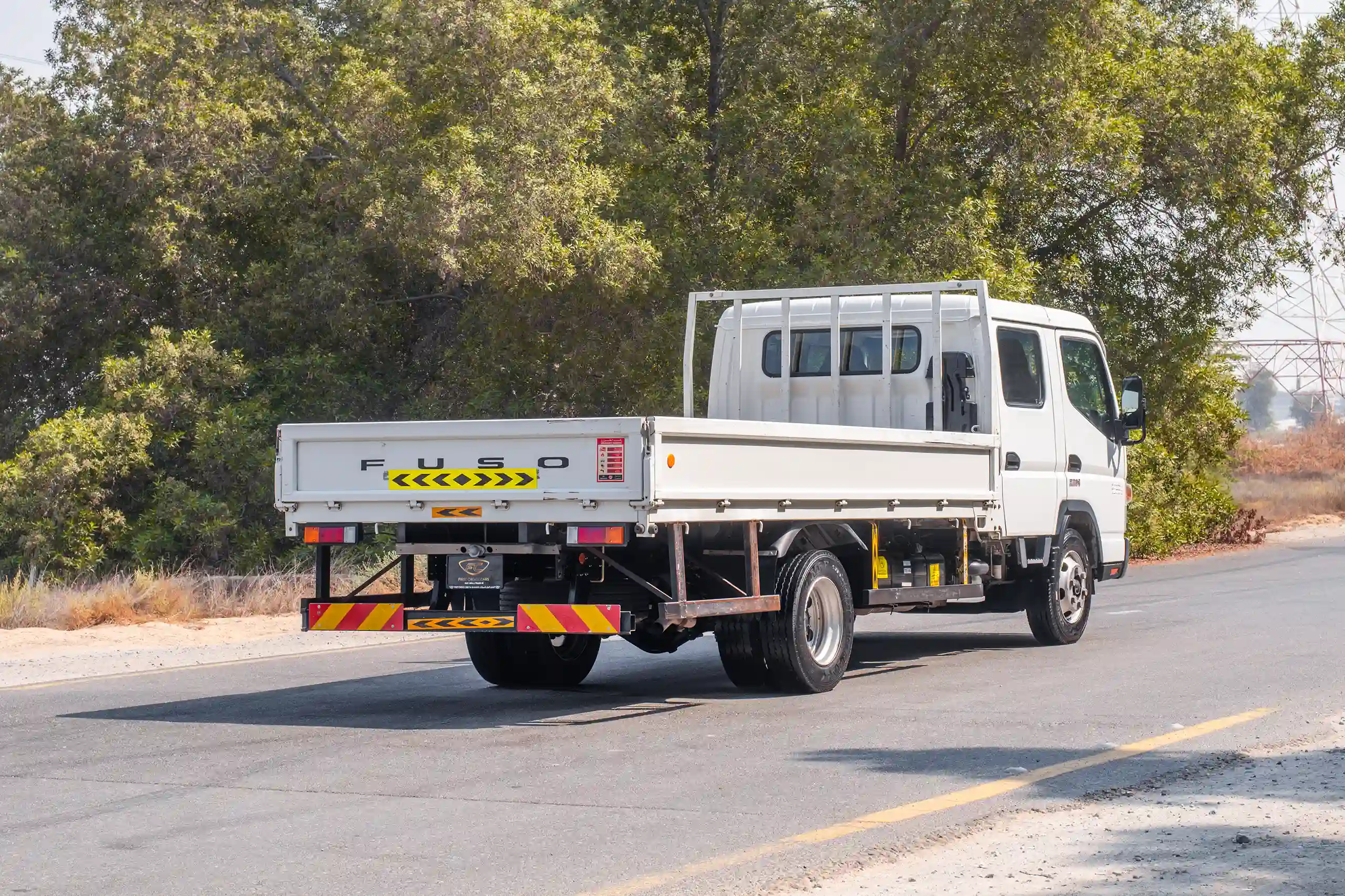 Used 2023 Mitsubishi Canter Double Cabin White – Right Back Diagonal (45°) View at First Choice Cars Sharjah