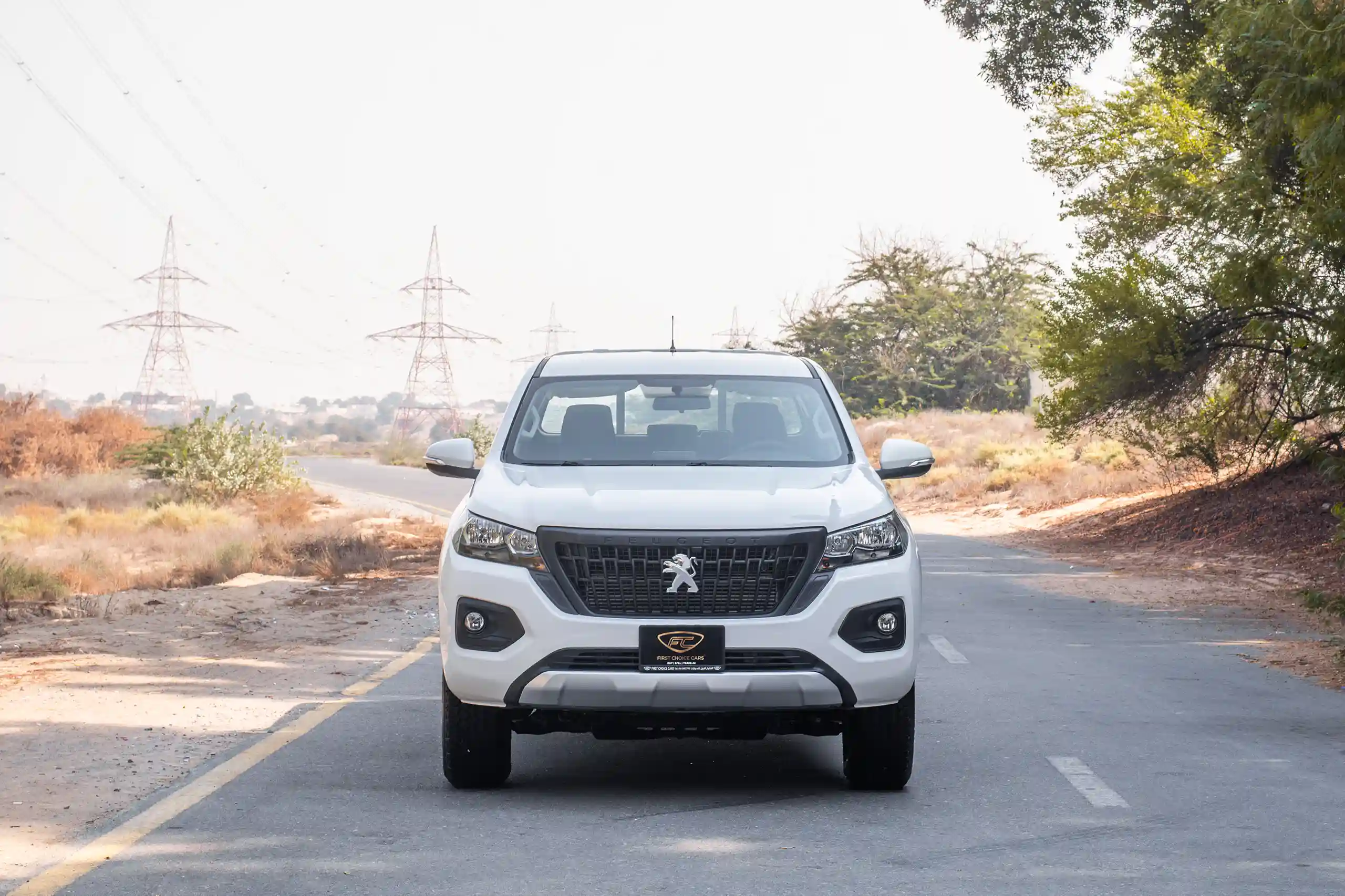 Used 2023 Peugeot Landtrek Double Cabin White – Front View at First Choice Cars Sharjah