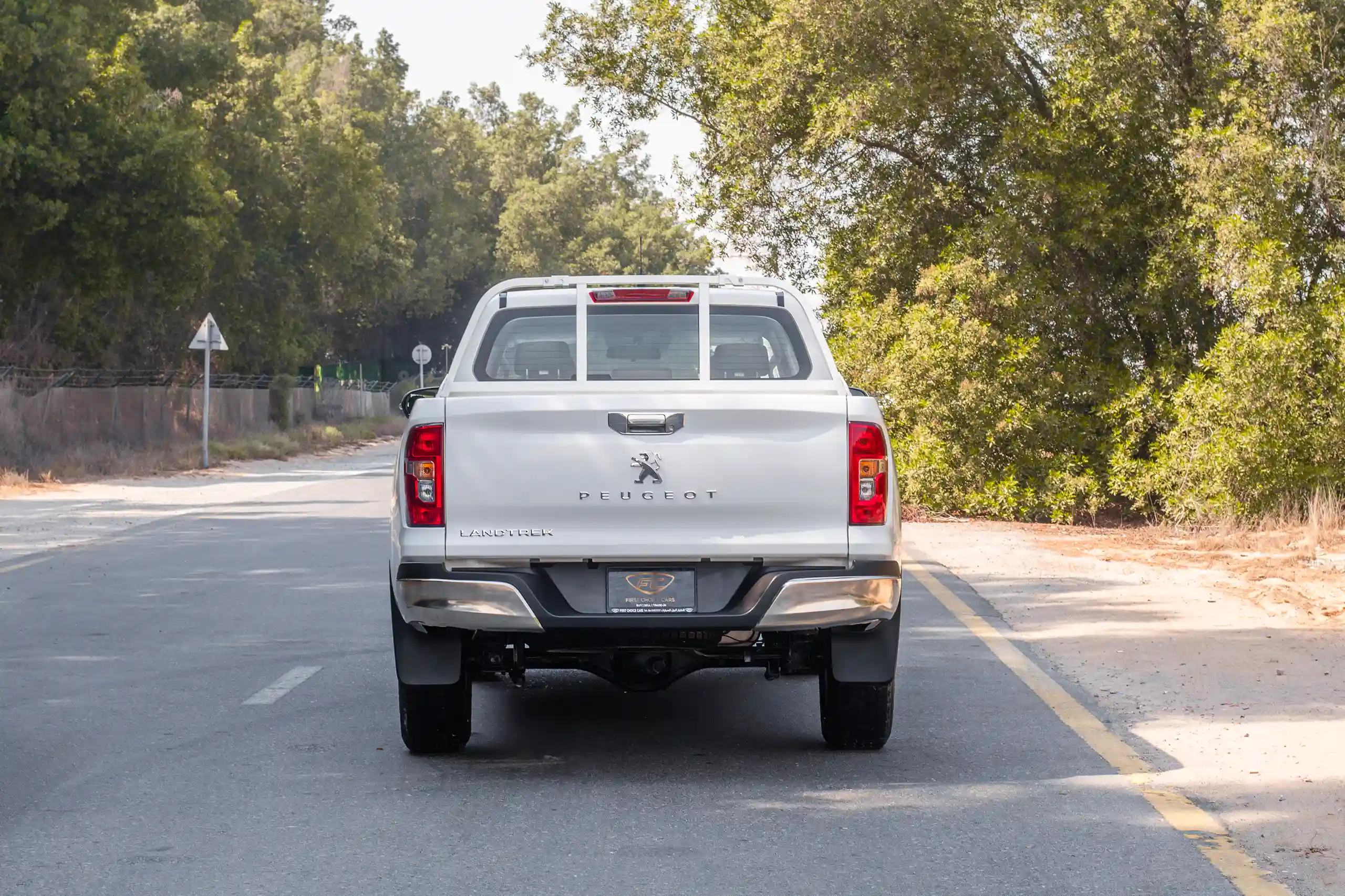 Used 2023 Peugeot Landtrek Double Cabin White – Back/Rear View at First Choice Cars Sharjah