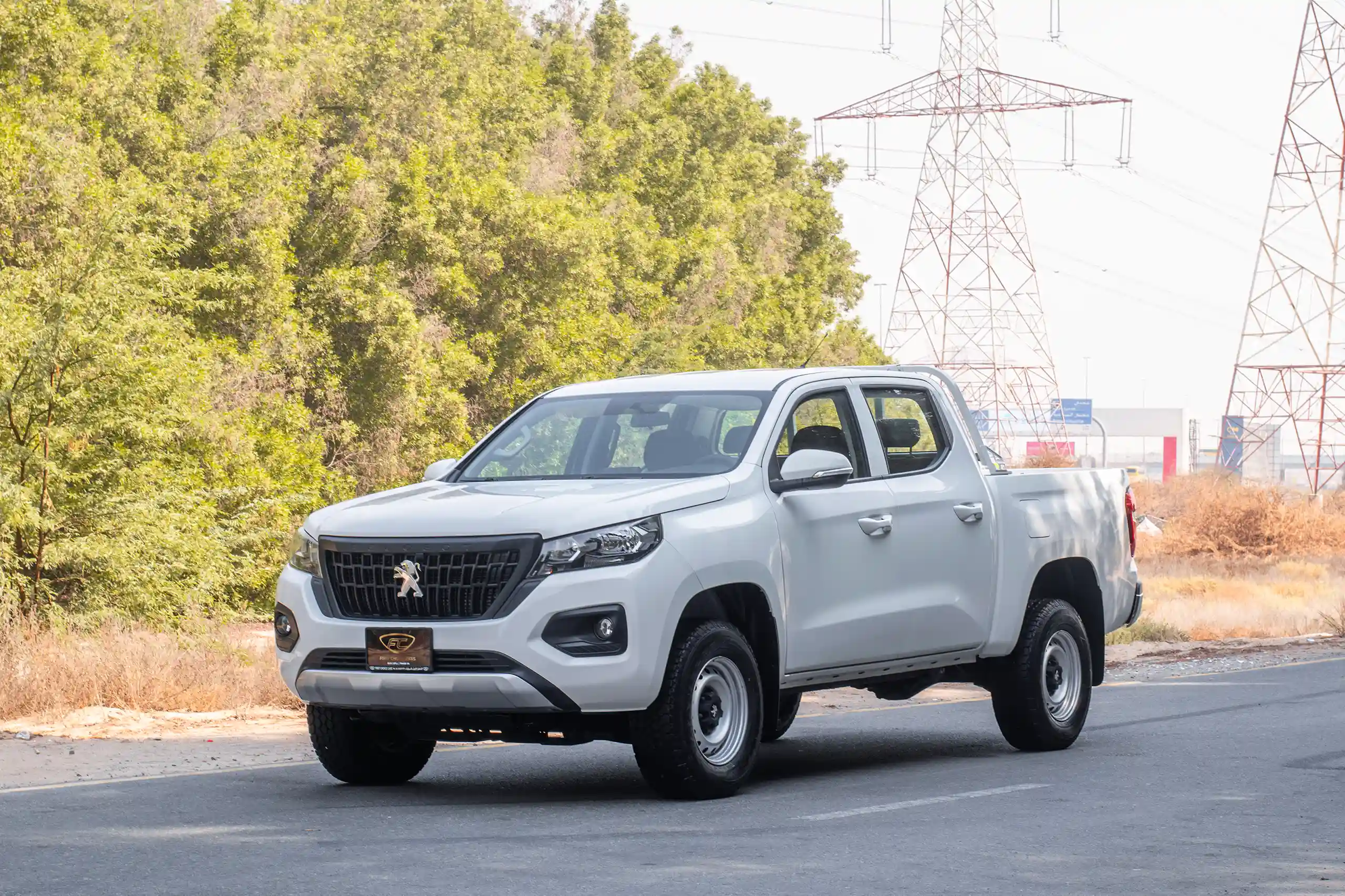 Used 2023 Peugeot Landtrek Double Cabin 4x2 White – Left Front Diagonal (45°) View at First Choice Cars Sharjah
