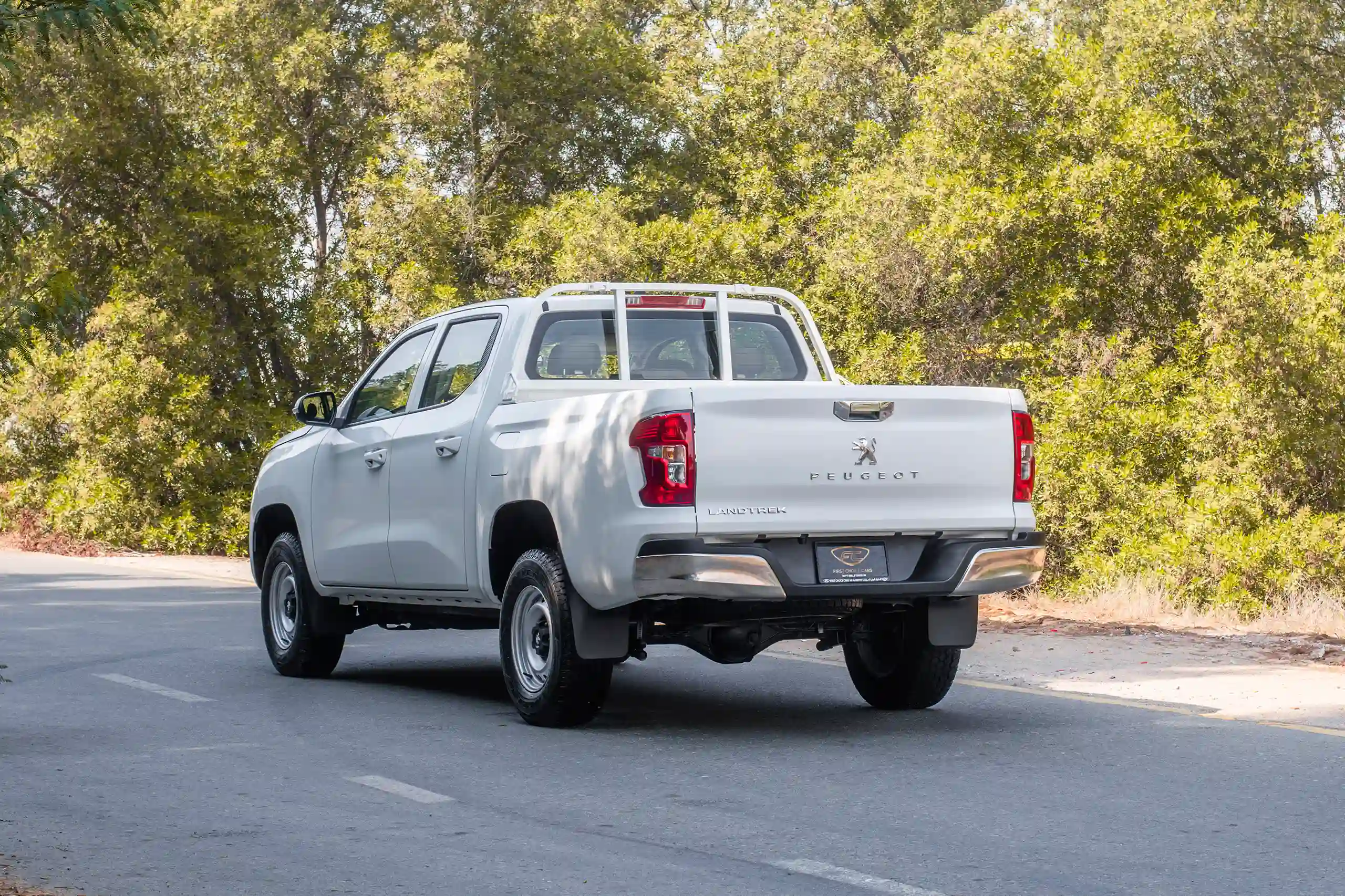 Used 2023 Peugeot Landtrek Double Cabin 4x2 White – Left Back Diagonal (45°) View at First Choice Cars Sharjah