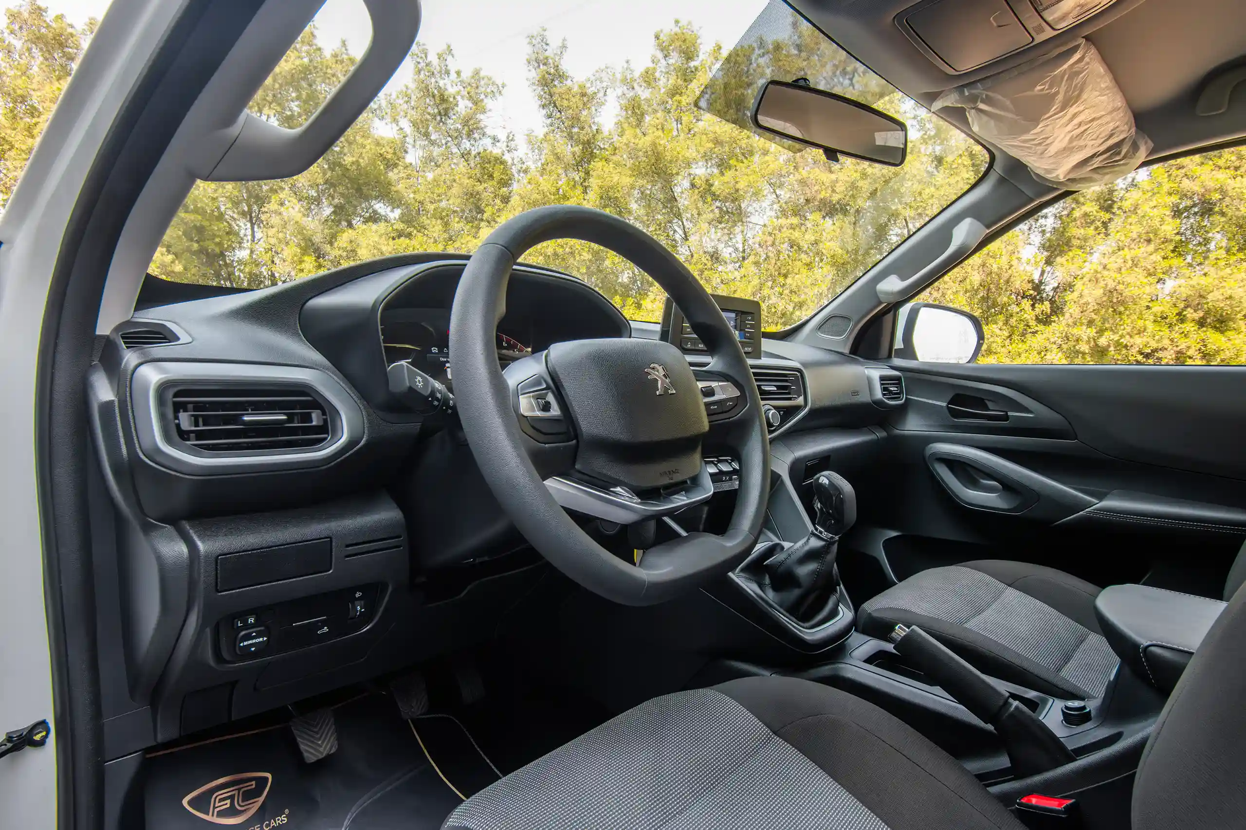 Used 2023 Peugeot Landtrek Double Cabin 4x2 White – Driver Side Dashboard & Steering View at First Choice Cars Sharjah