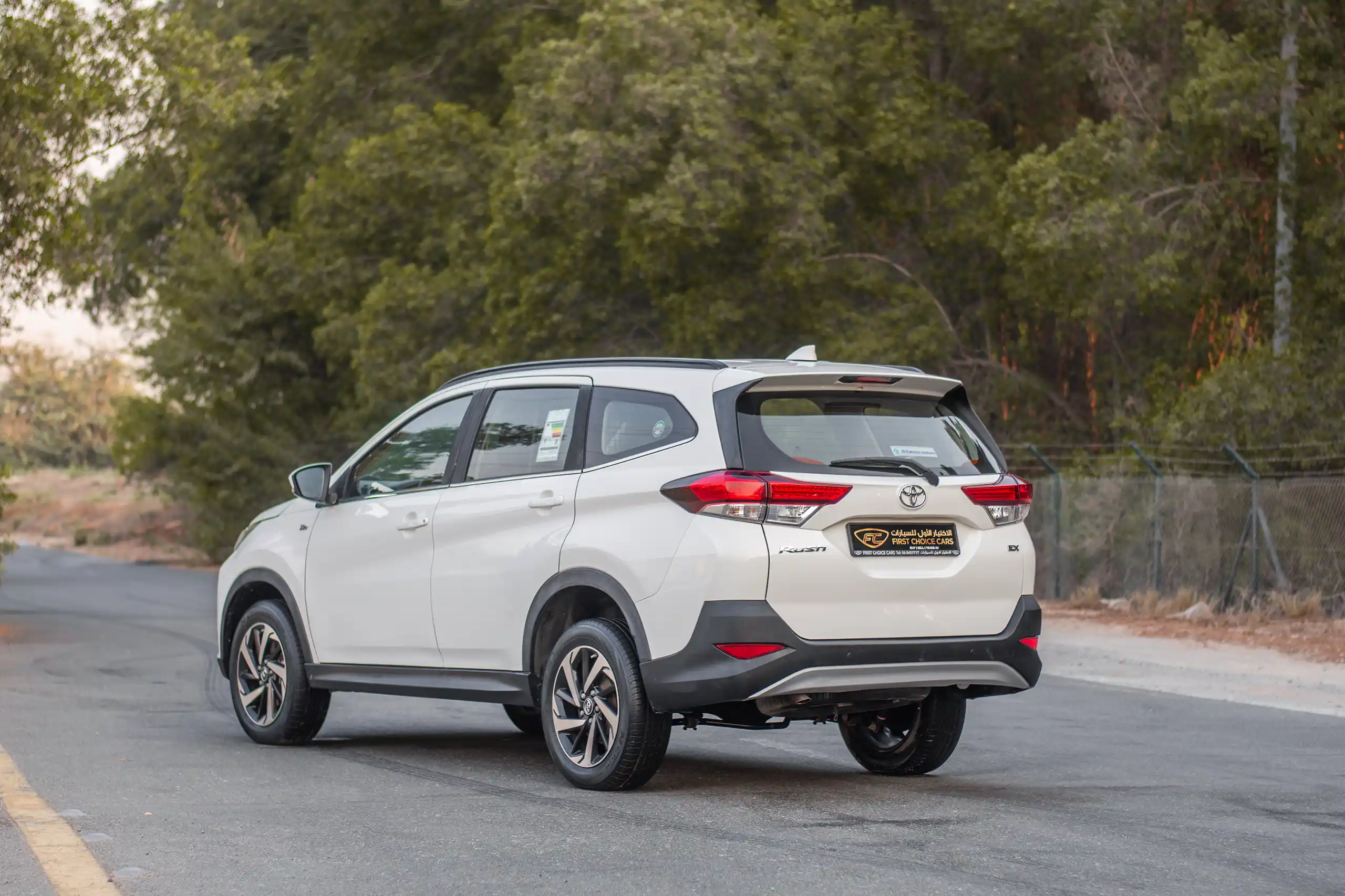 Used 2023 Toyota Rush Ex White – Left Back Diagonal (45°) View at First Choice Cars Sharjah