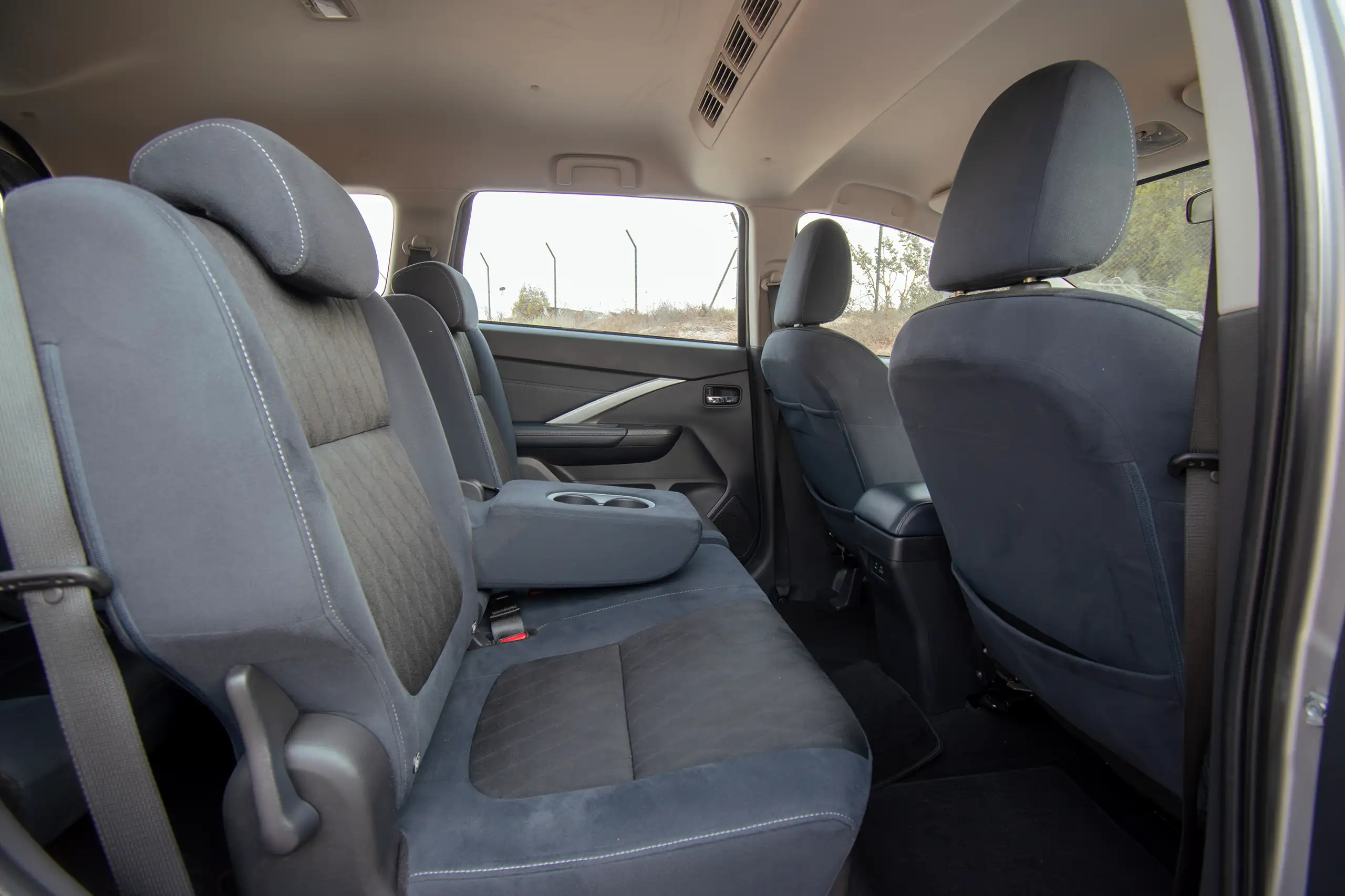 Used 2024 Mitsubishi Xpander Cross Premium Silver – Rear Driver Side Cabin View at First Choice Cars Sharjah