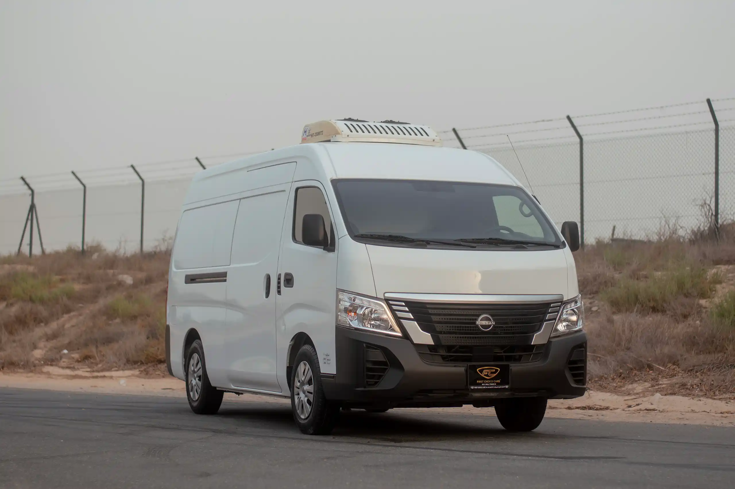 Used 2023 Nissan Urvan High Roof Chiller White – Right Front Diagonal (45°) View at First Choice Cars Sharjah