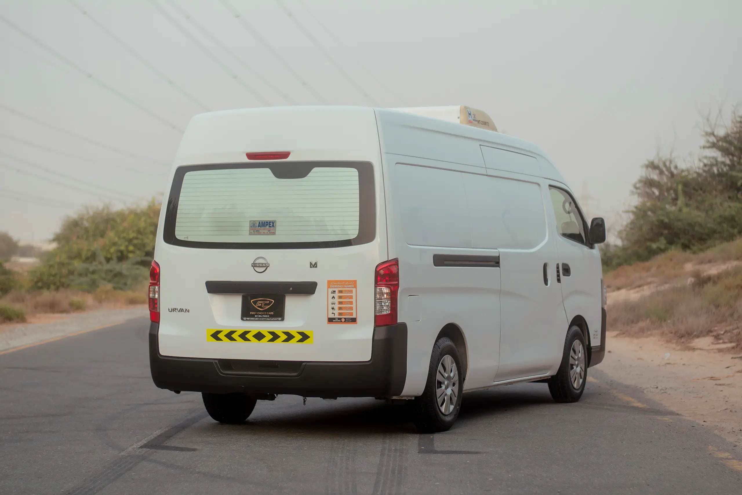 Used 2023 Nissan Urvan High Roof Chiller White – Right Back Diagonal (45°) View at First Choice Cars Sharjah