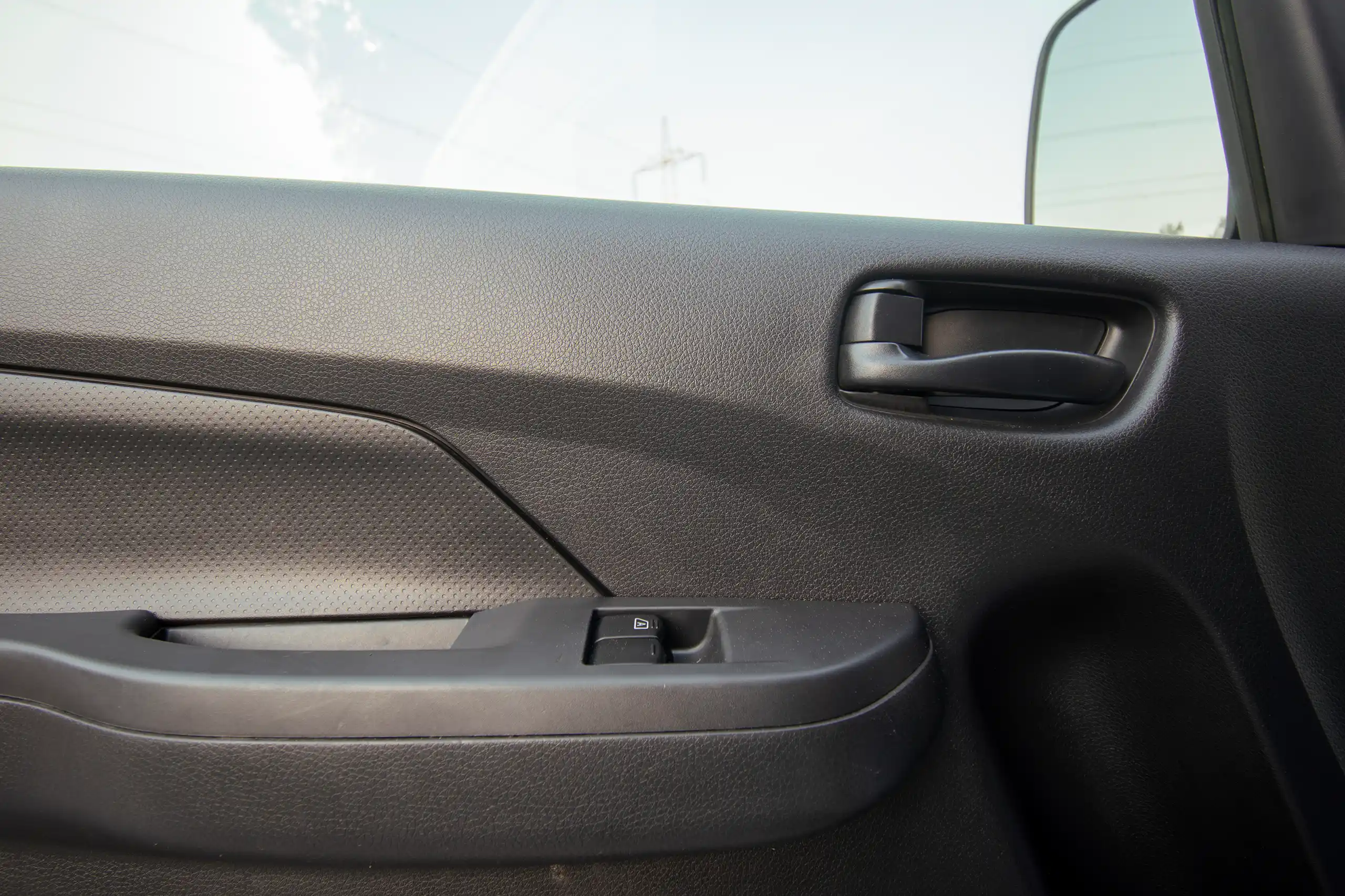 Used 2023 Nissan Urvan High Roof Chiller White – Driver Door Panel Full View at First Choice Cars Sharjah