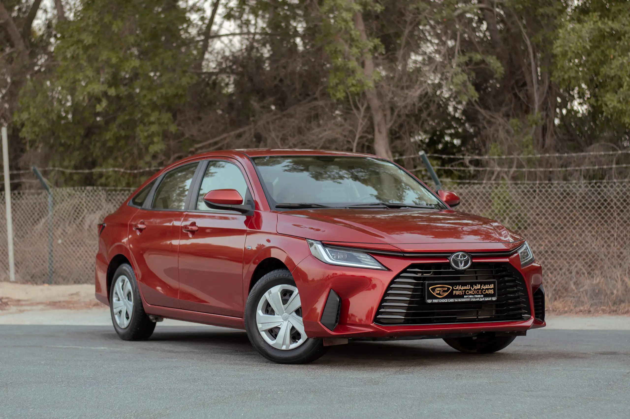 Used 2023 Toyota Yaris 1.5L E Red – Right Front Diagonal (45°) View at First Choice Cars Sharjah