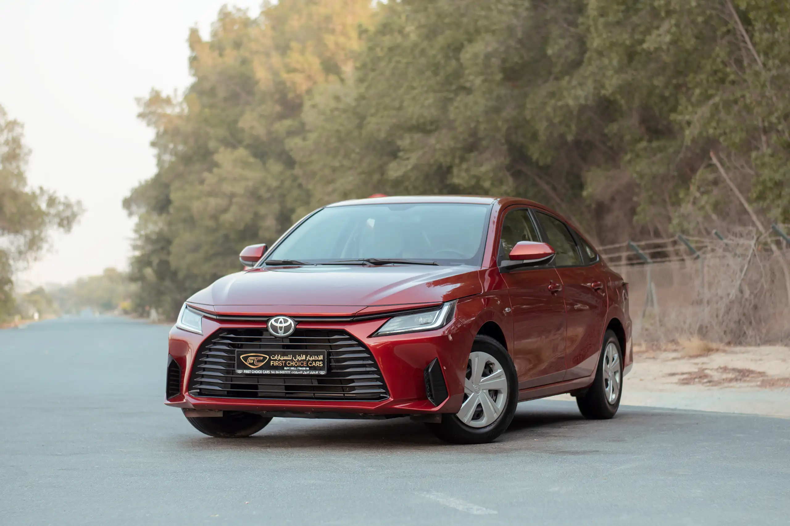 Used 2023 Toyota Yaris E Red – Left Front Diagonal (45°) View at First Choice Cars Sharjah