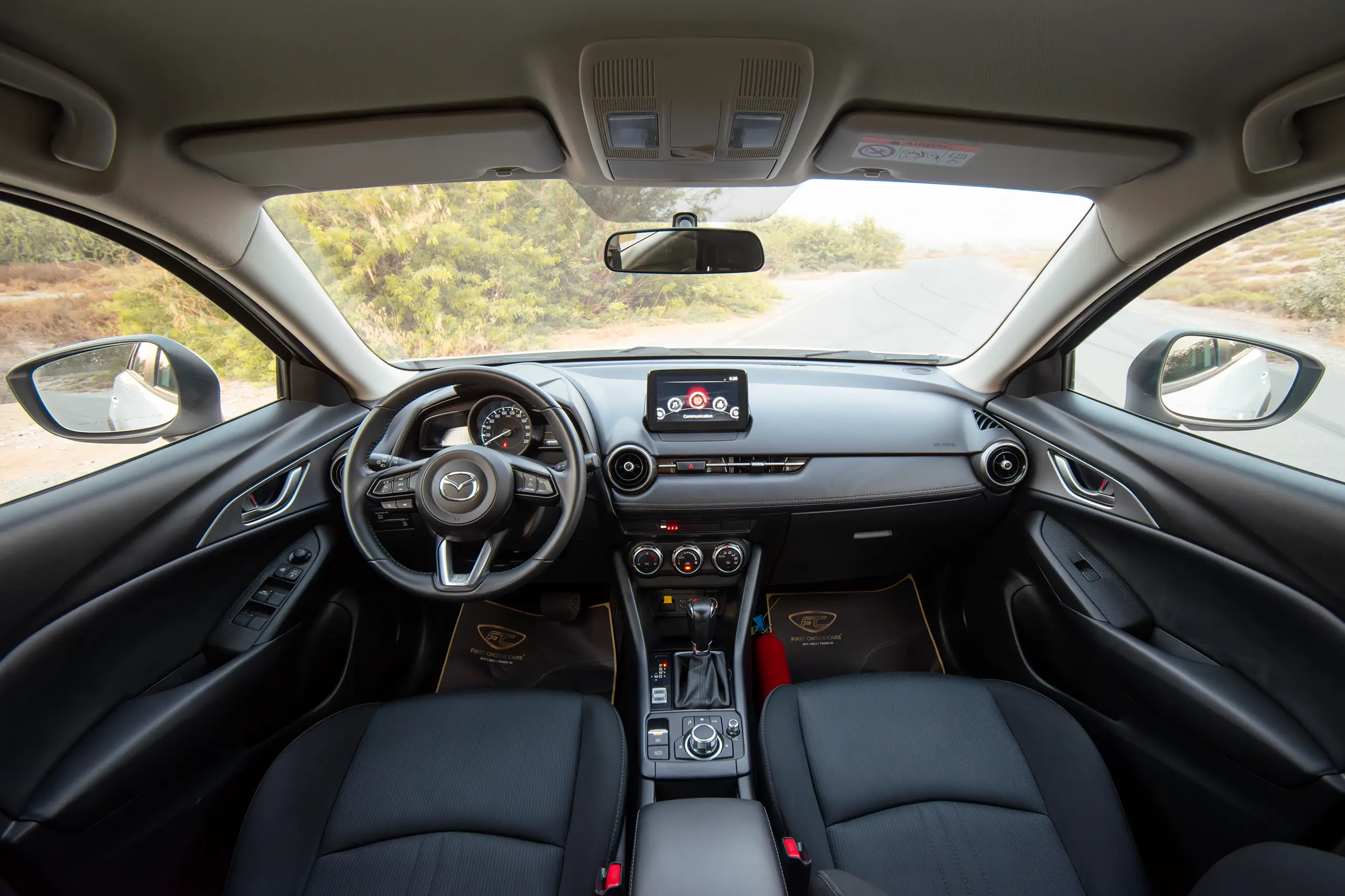 Used 2023 Mazda CX-3 Gs White – Front Cabin / Dashboard Full View at First Choice Cars Sharjah