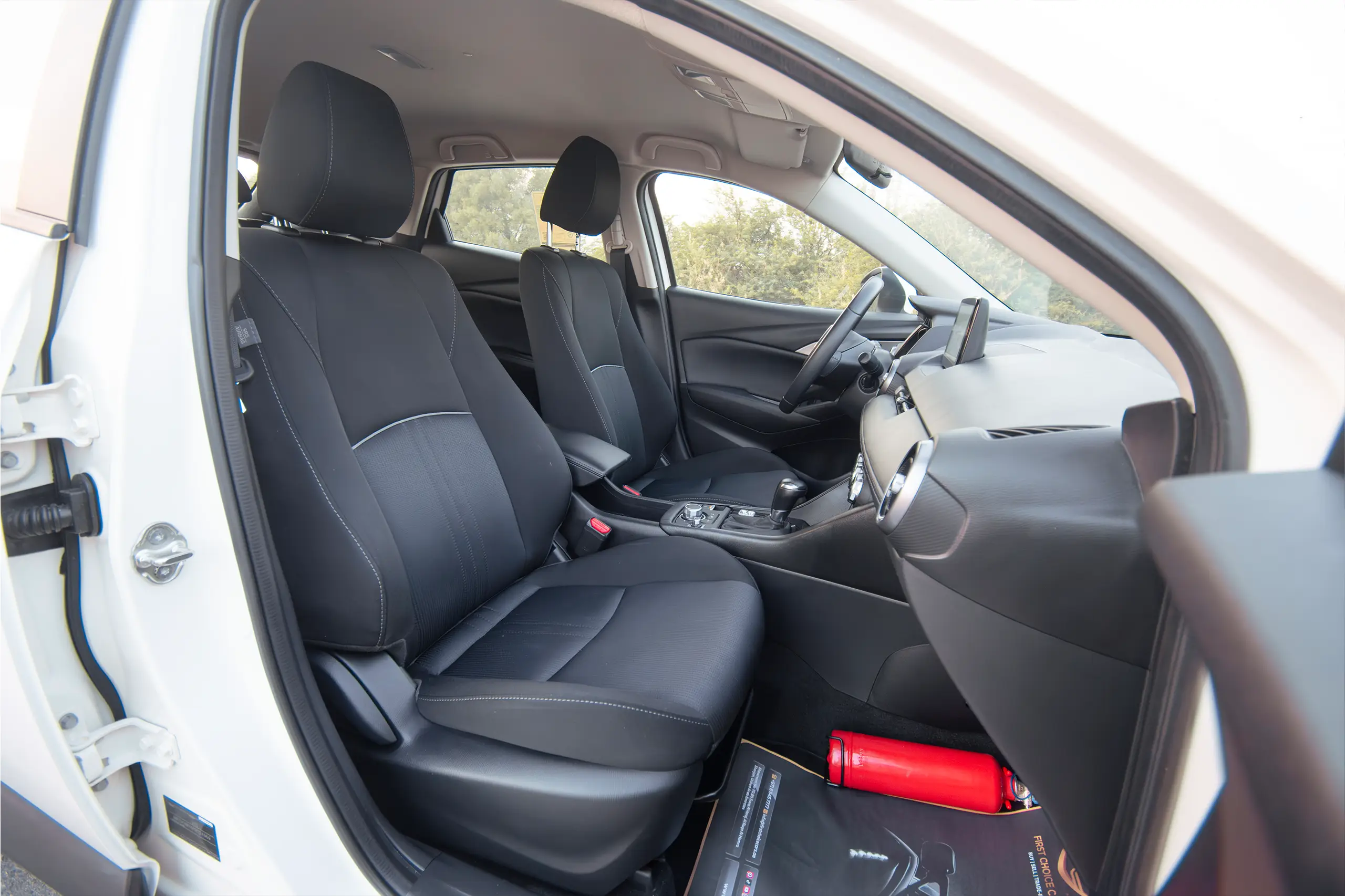 Used 2023 Mazda CX-3 Gs White – Front Passenger Side Cabin View at First Choice Cars Sharjah