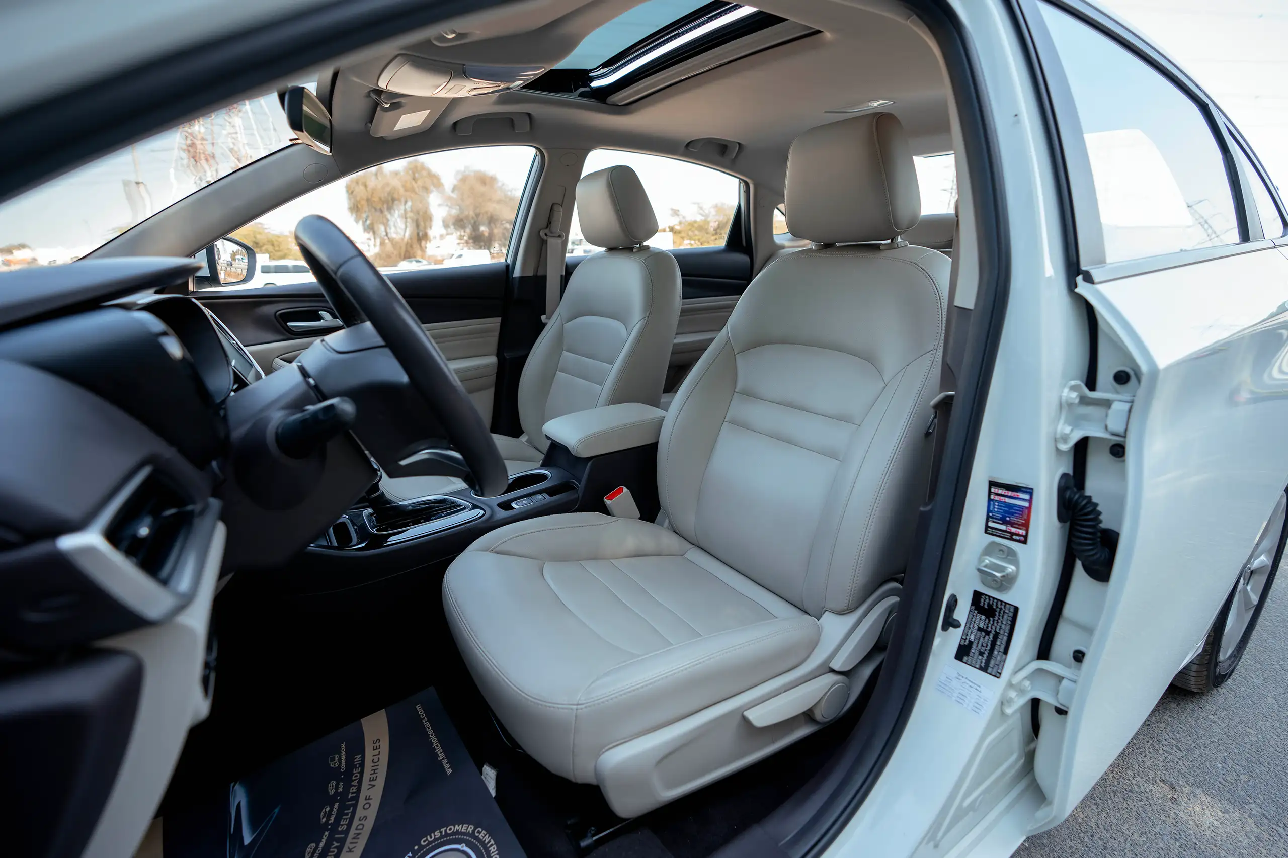 Used 2023 GAC GA4 GE White – Front Driver Side Cabin View at First Choice Cars Sharjah