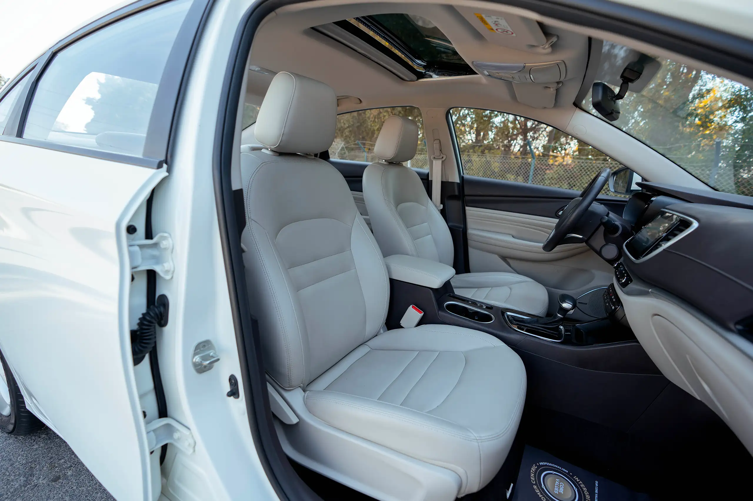 Used 2023 GAC GA4 GE White – Front Passenger Side Cabin View at First Choice Cars Sharjah