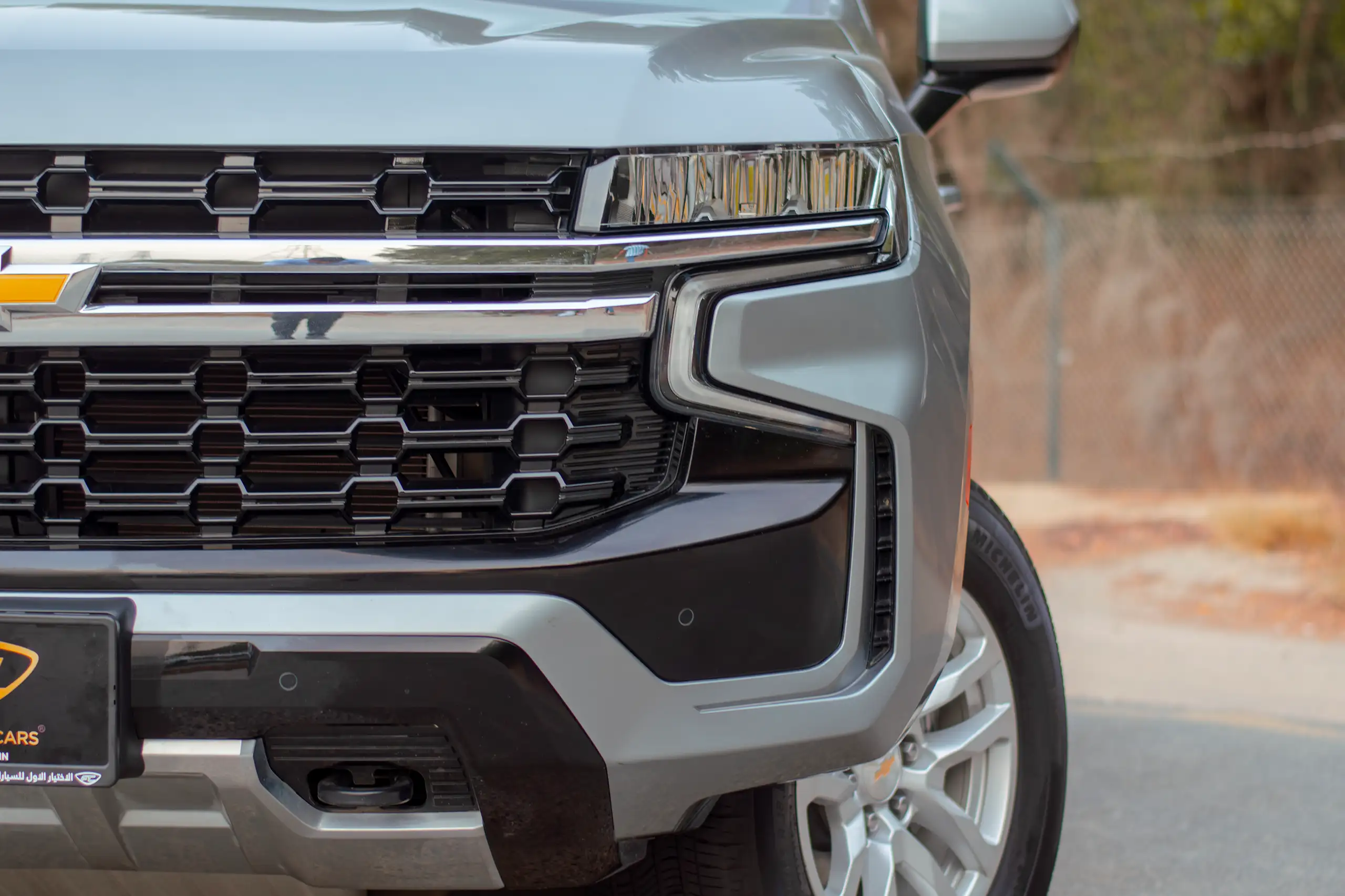 Used 2023 Chevrolet Tahoe LS Grey – Headlight Close-up at First Choice Cars Sharjah