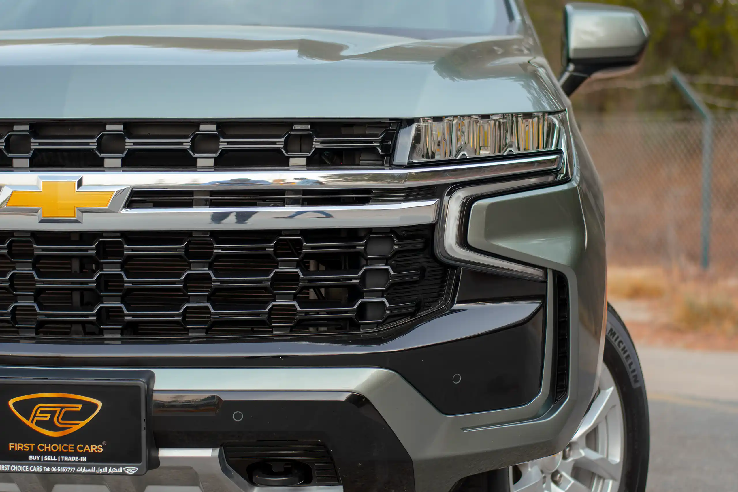 Used 2023 Chevrolet Tahoe LS Green – Headlight Close-up at First Choice Cars Sharjah