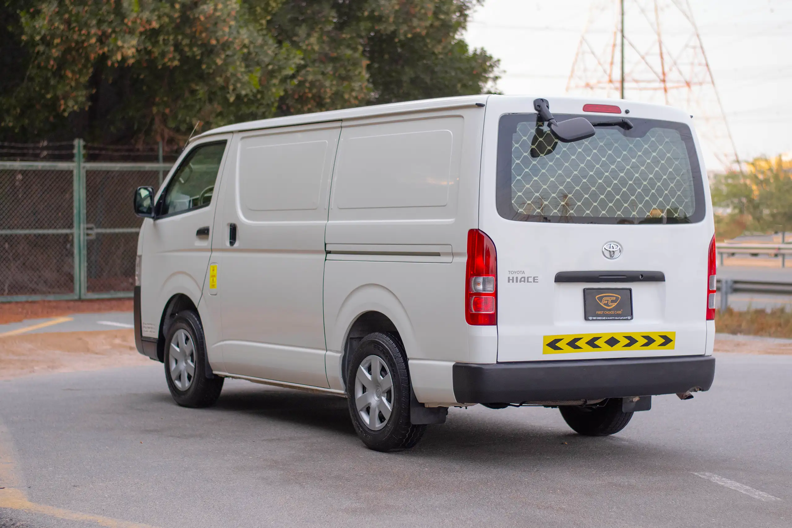 Used 2022 Toyota Hiace GL Std Roof 3 STR Panel Van White – Left Back Diagonal (45°) View at First Choice Cars Sharjah