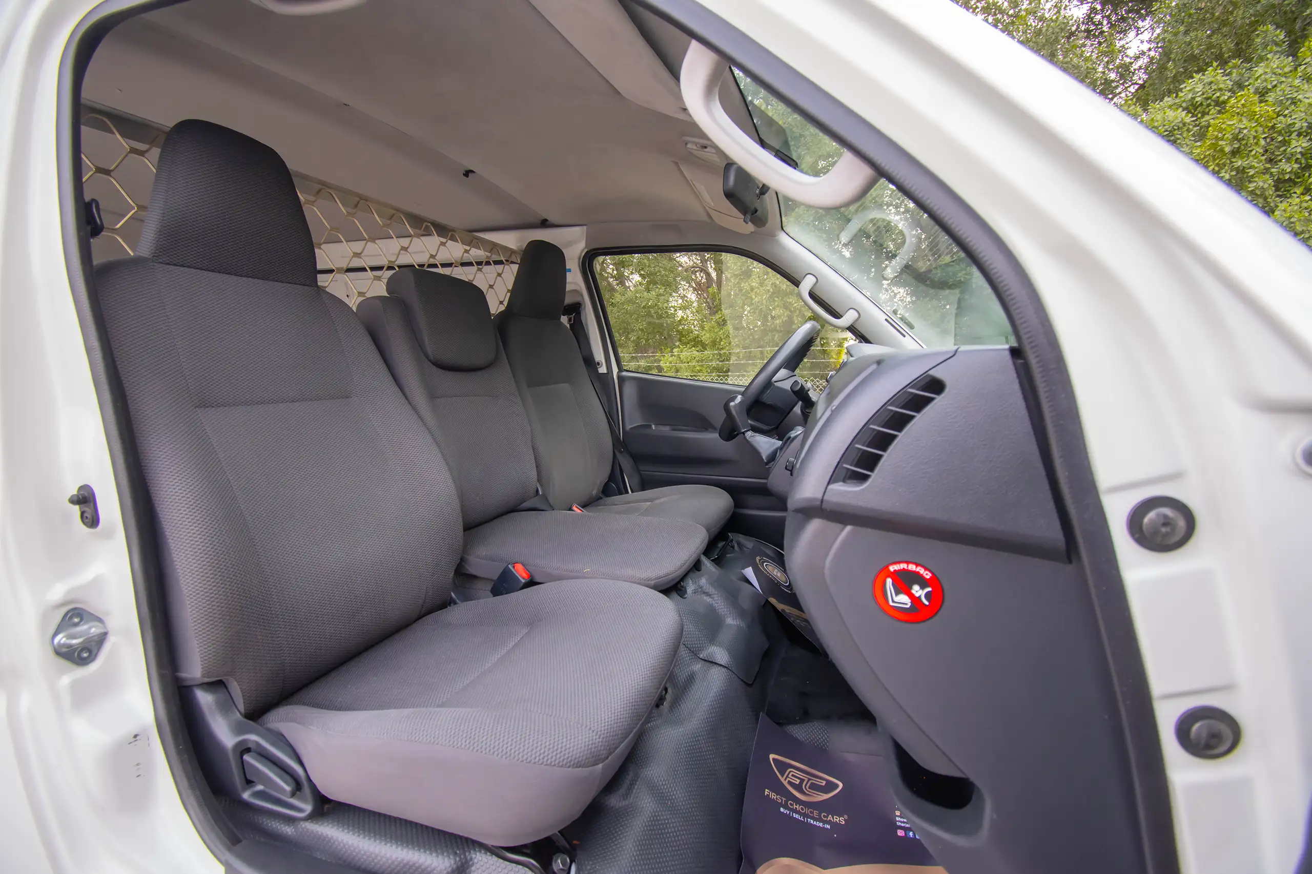 Used 2022 Toyota Hiace GL Std Roof 3 STR Panel Van White – Front Passenger Side Cabin View at First Choice Cars Sharjah