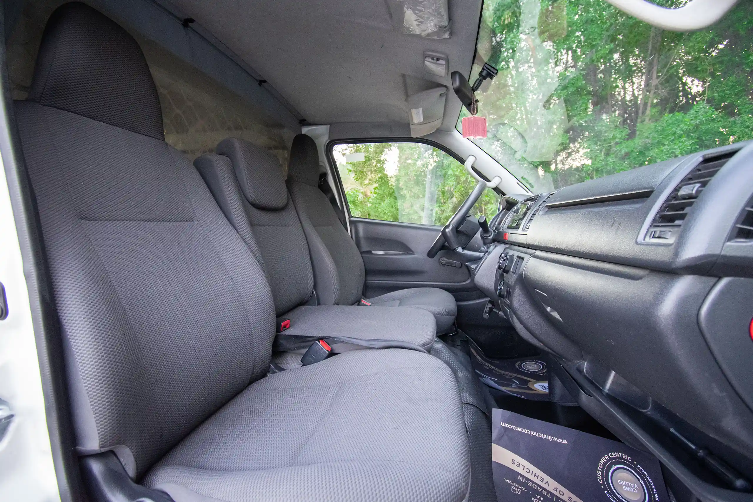 Used 2022 Toyota Hiace GL Std Roof 3 STR Panel Van White – Front Passenger Side Cabin View at First Choice Cars Sharjah