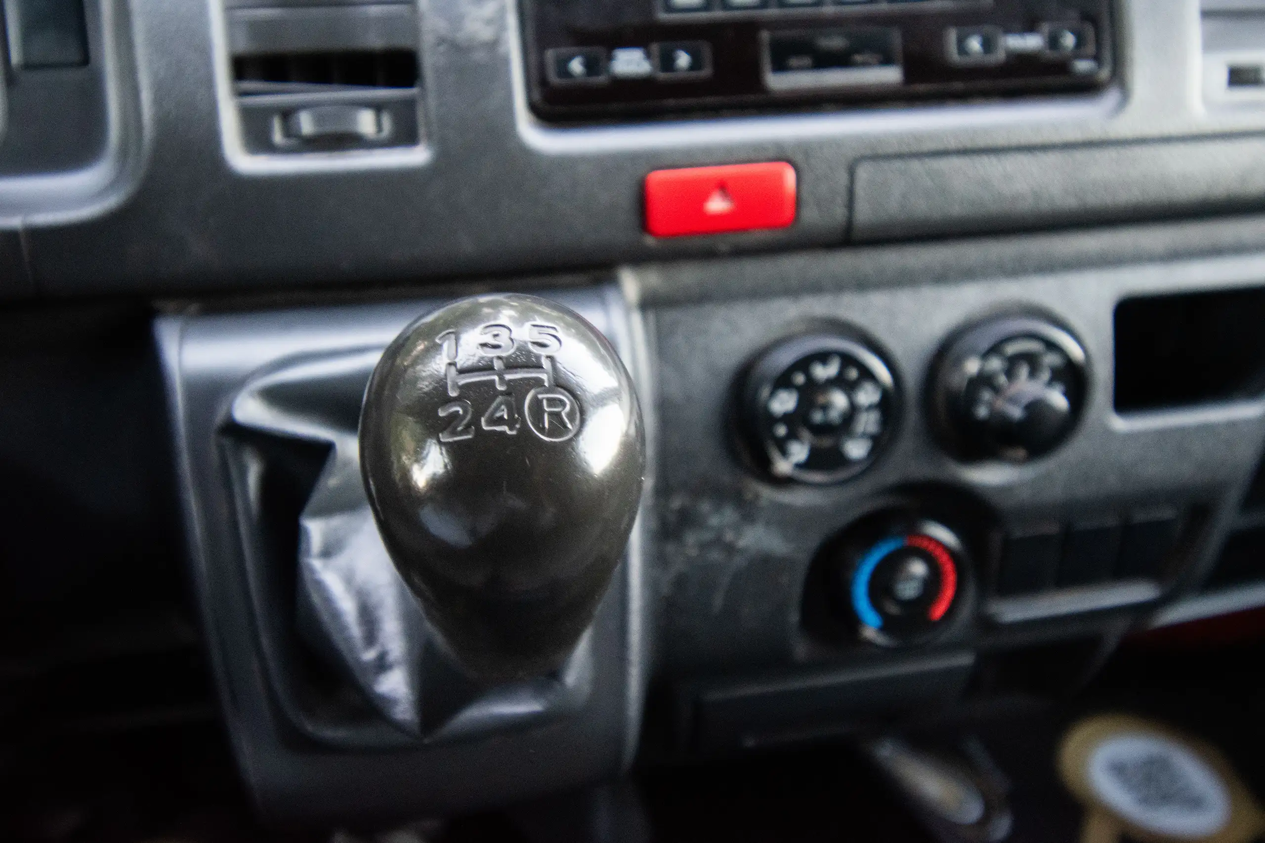 Used 2022 Toyota Hiace GL Std Roof 3 STR Panel Van White – Center Console & Gear Shifter at First Choice Cars Sharjah