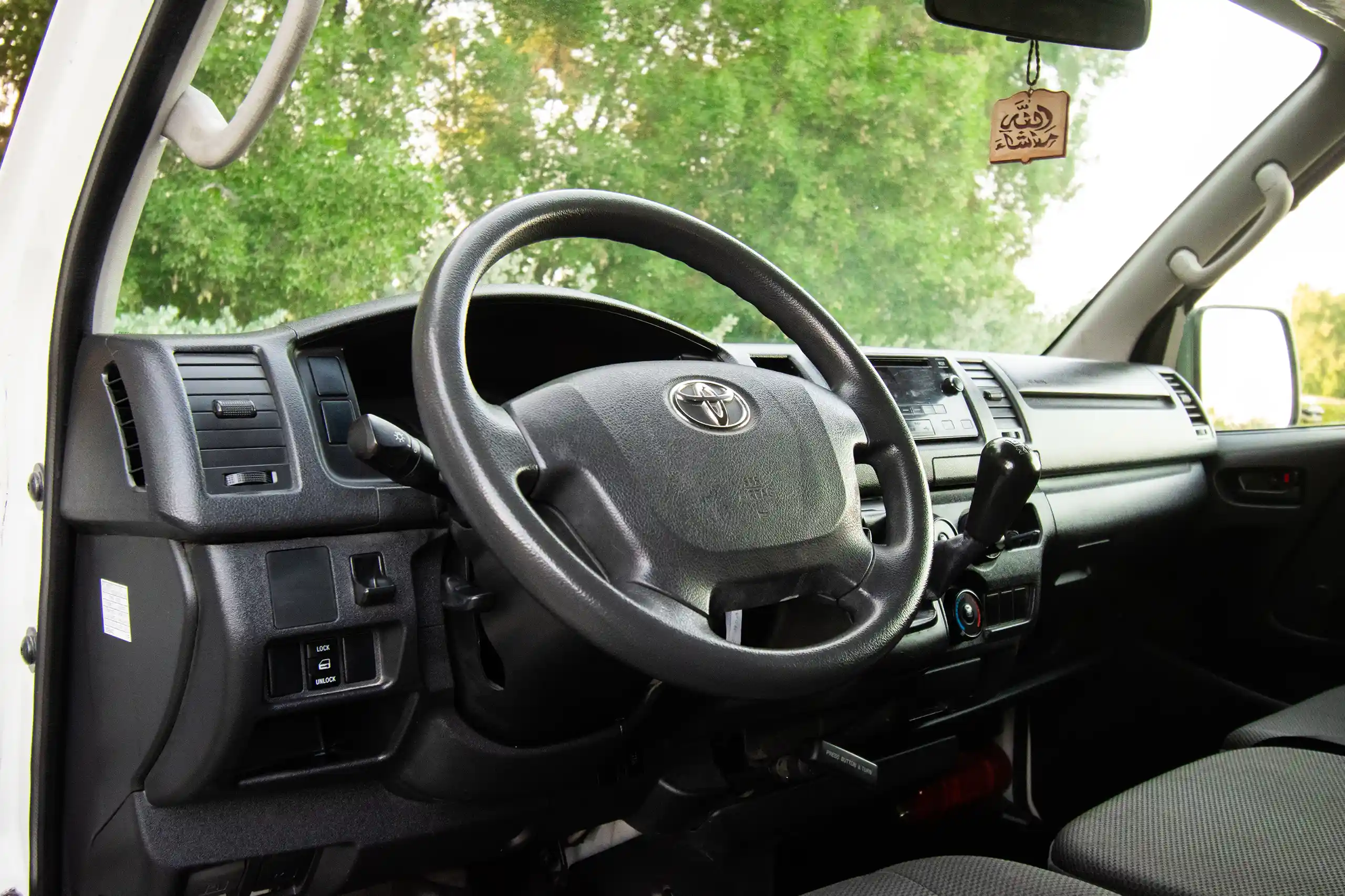 Used 2022 Toyota Hiace GL - Std Roof White – Driver Side Dashboard & Steering View at First Choice Cars Sharjah