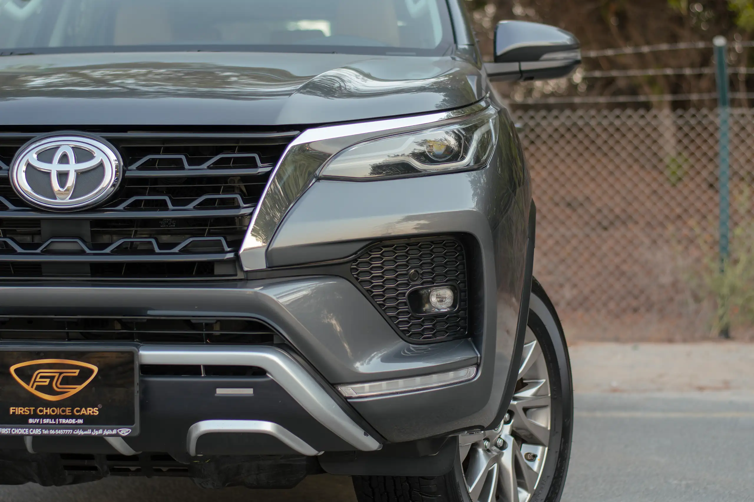 Used 2022 Toyota Fortuner 4.0L VXR Grey – Headlight Close-up at First Choice Cars Sharjah