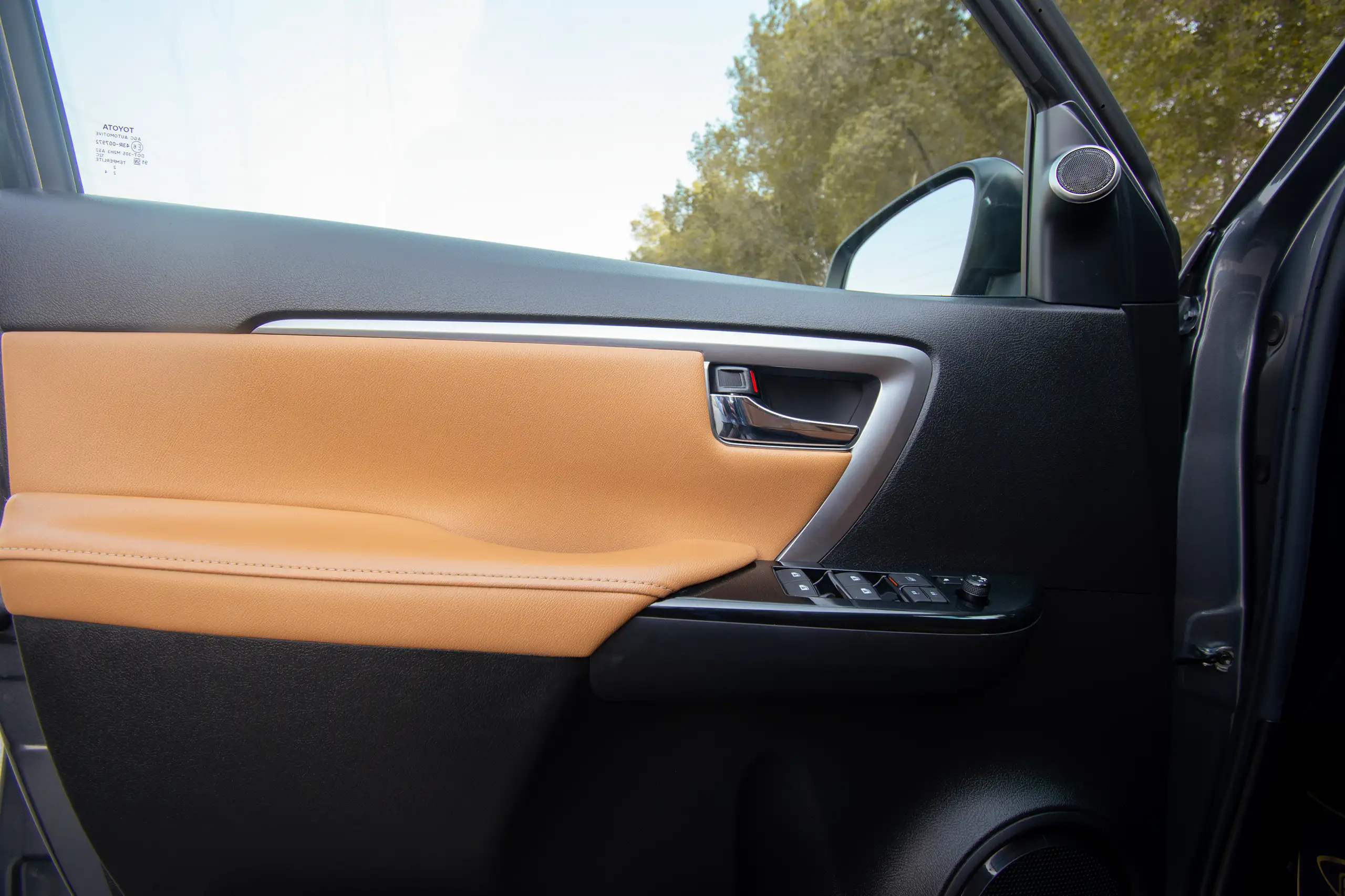 Used 2022 Toyota Fortuner 4.0L VXR Grey – Driver Door Panel Full View at First Choice Cars Sharjah