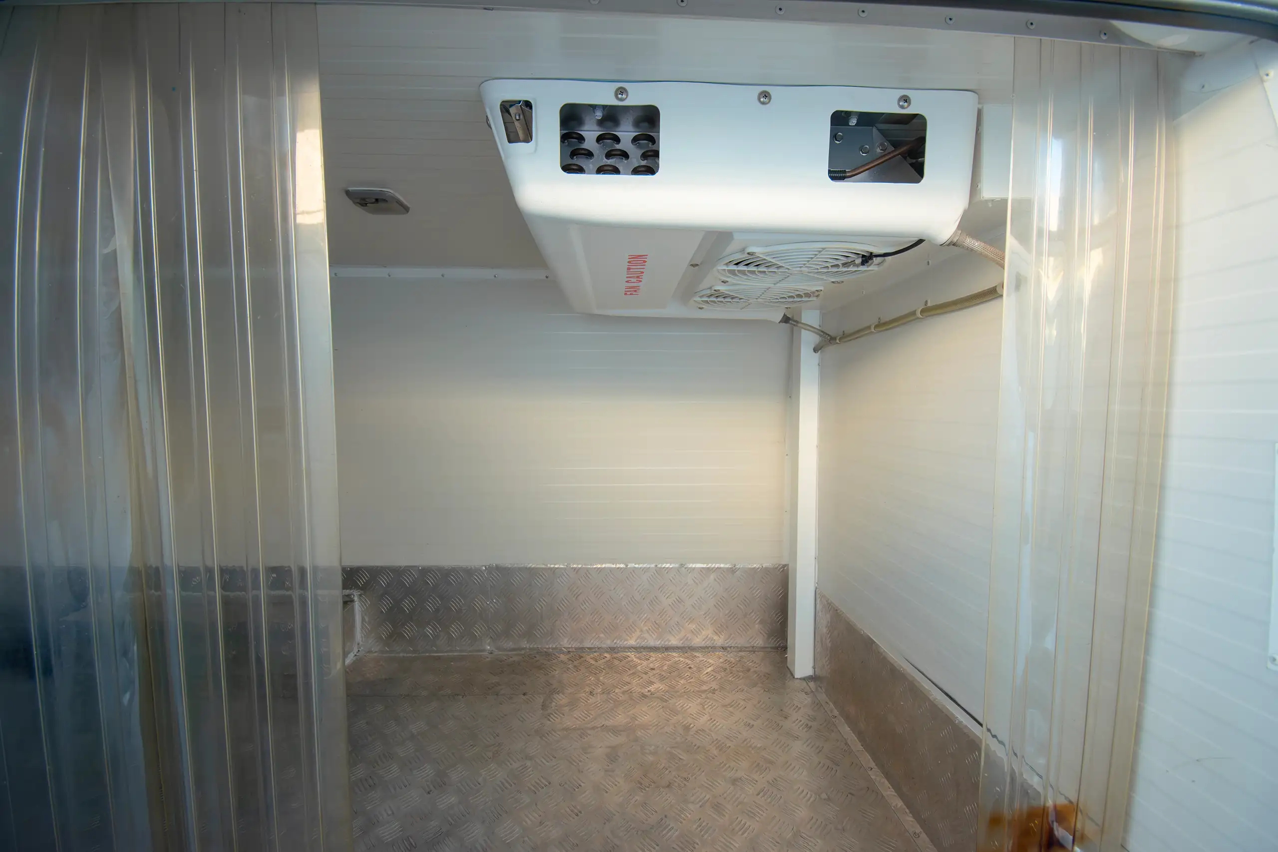 Used 2022 Nissan Urvan Standard Roof Chiller White – Chiller Box Right Side Interior View at First Choice Cars Sharjah