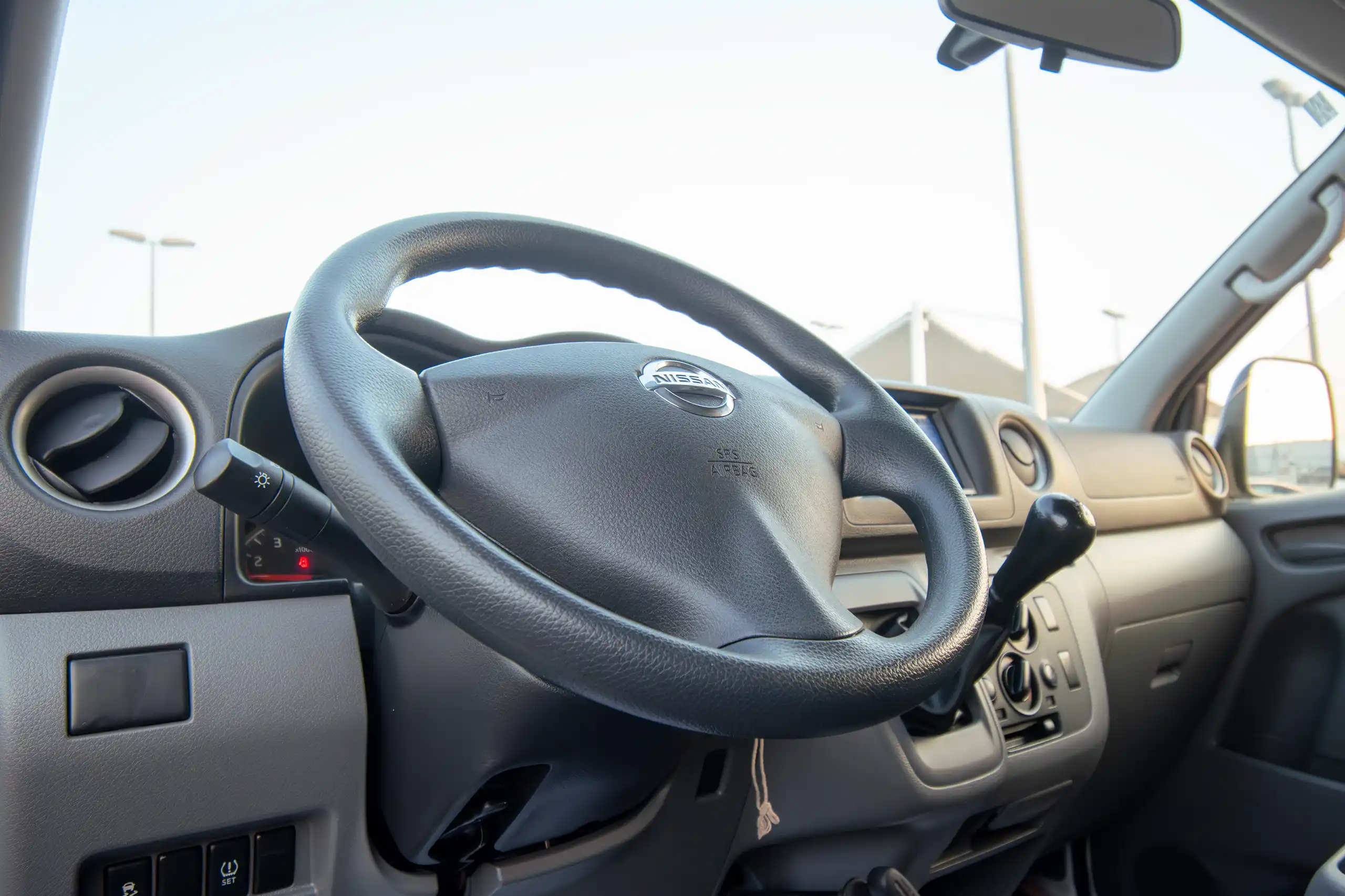 Used 2022 Nissan Urvan Panel Van S/R White – Driver Side Dashboard & Steering View at First Choice Cars Sharjah