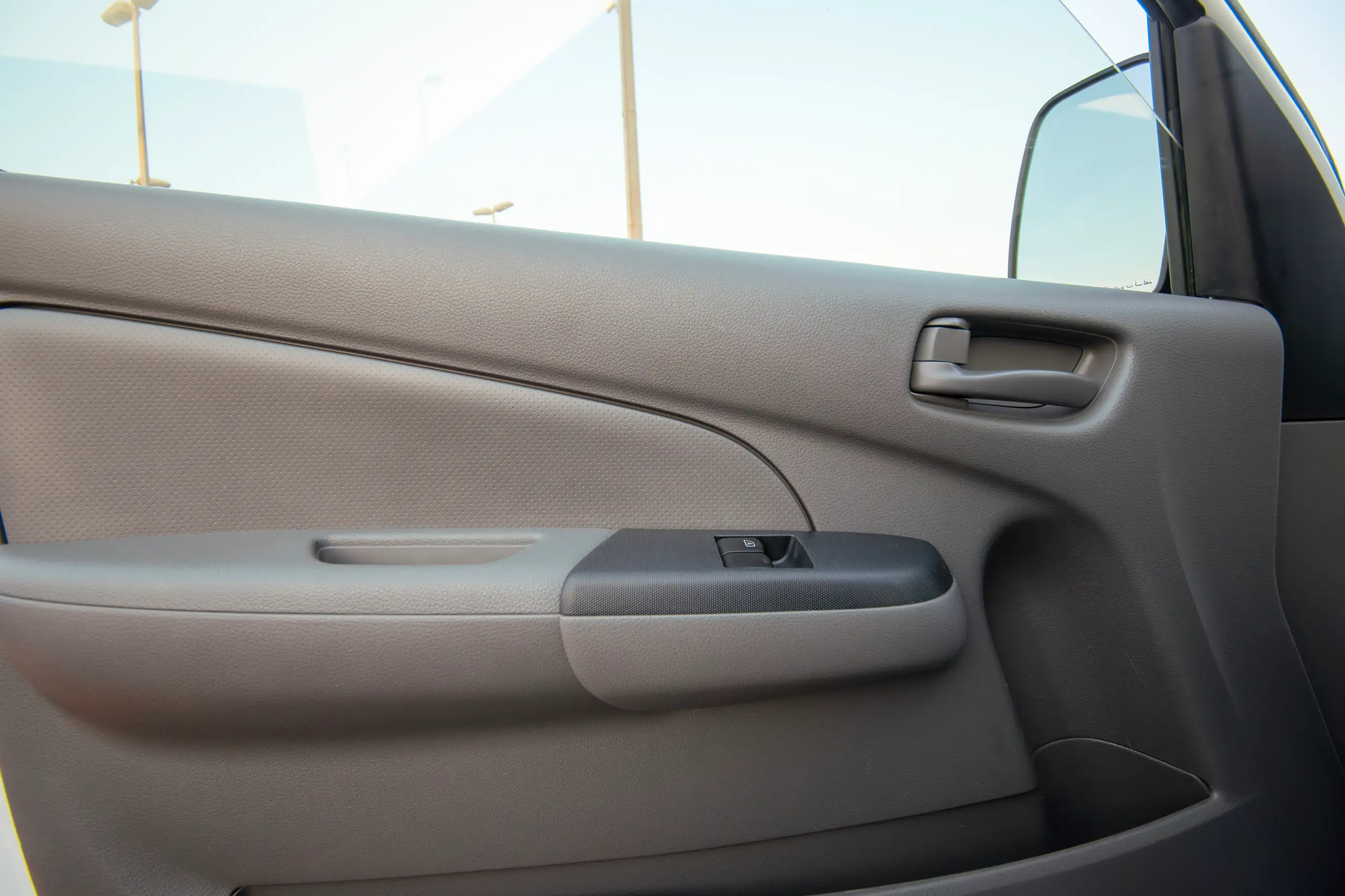 Used 2022 Nissan Urvan Panel Van S/R White – Driver Door Panel Full View at First Choice Cars Sharjah