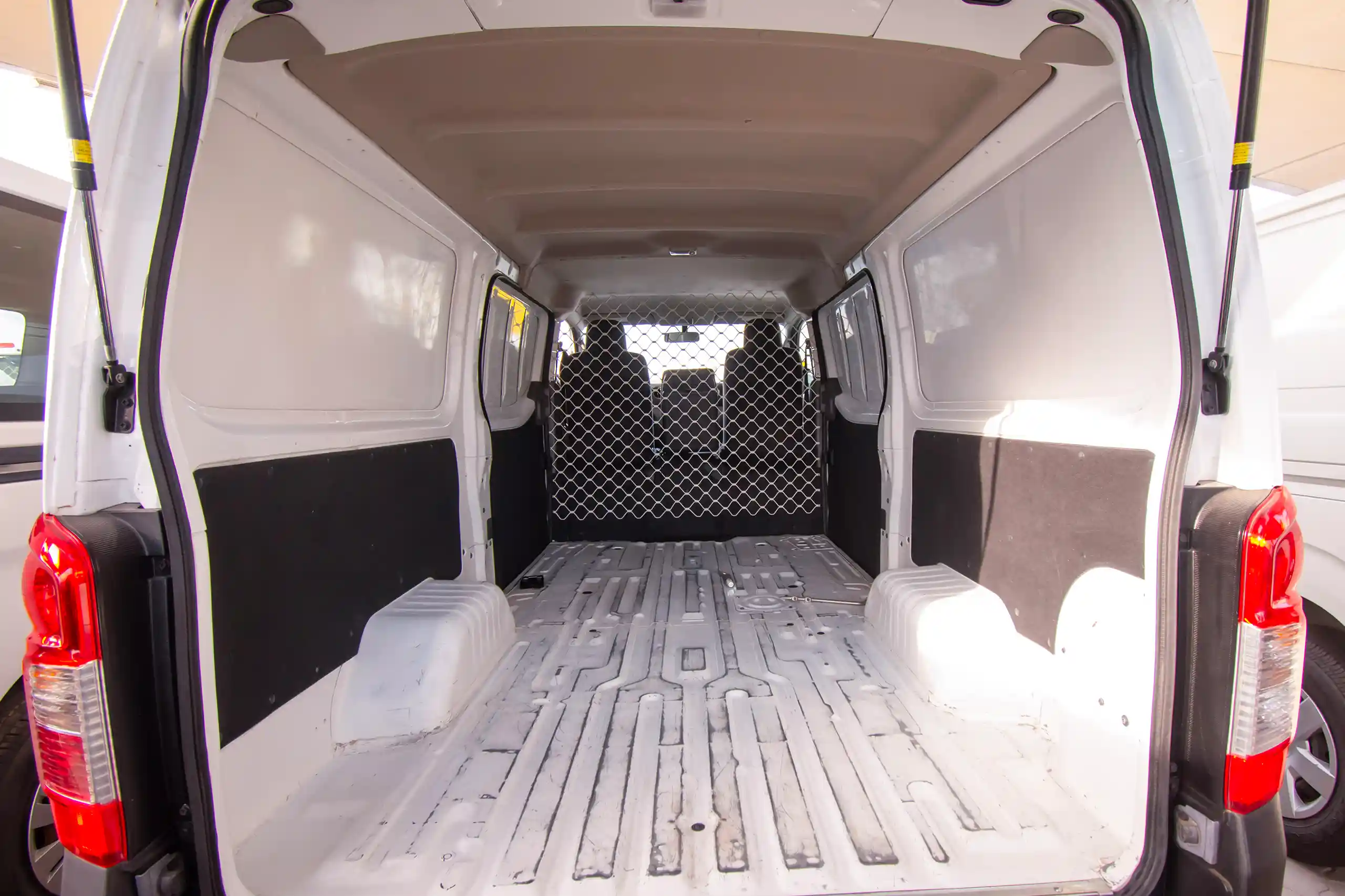 Used 2022 Nissan Urvan Panel Van S/R White – Delivery Box Rear Opening View at First Choice Cars Sharjah