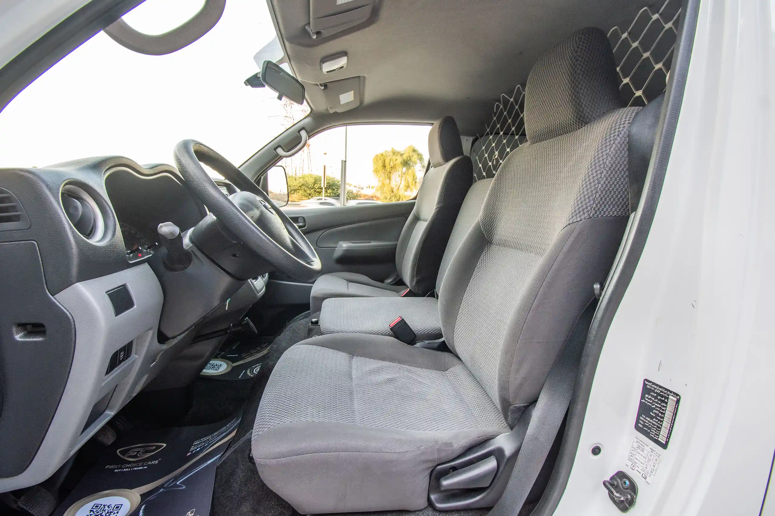 Used 2022 Nissan Urvan Panel Van S/R White – Front Driver Side Cabin View at First Choice Cars Sharjah