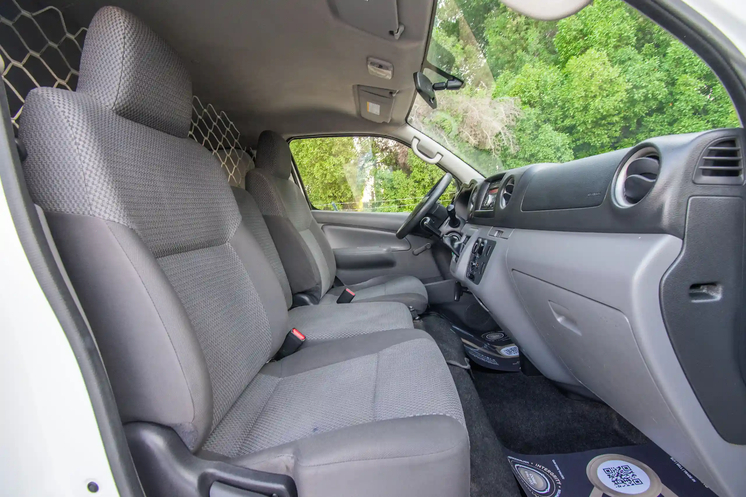 Used 2022 Nissan Urvan Panel Van S/R White – Front Passenger Side Cabin View at First Choice Cars Sharjah