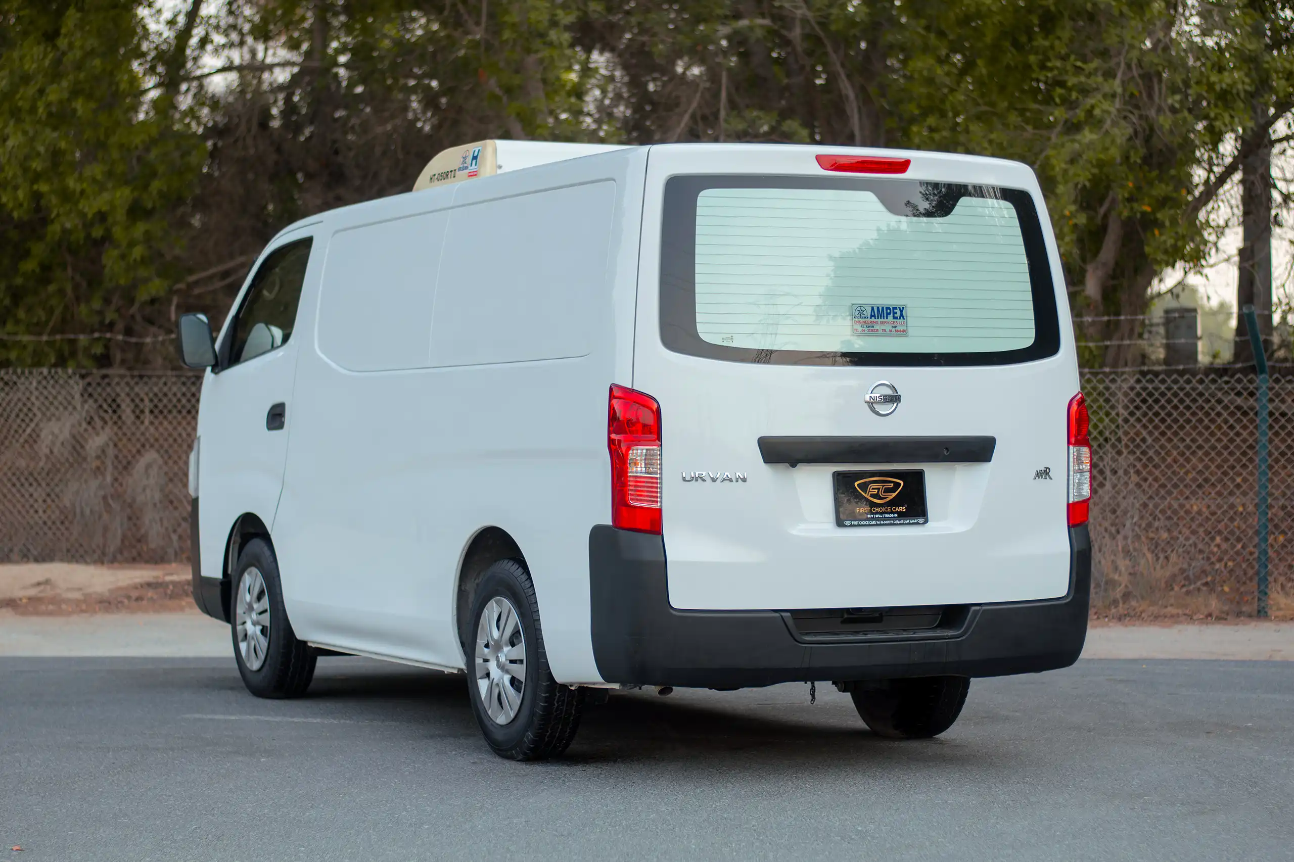 Used 2022 Nissan Urvan Standard Roof Chiller White – Left Back Diagonal (45°) View at First Choice Cars Sharjah