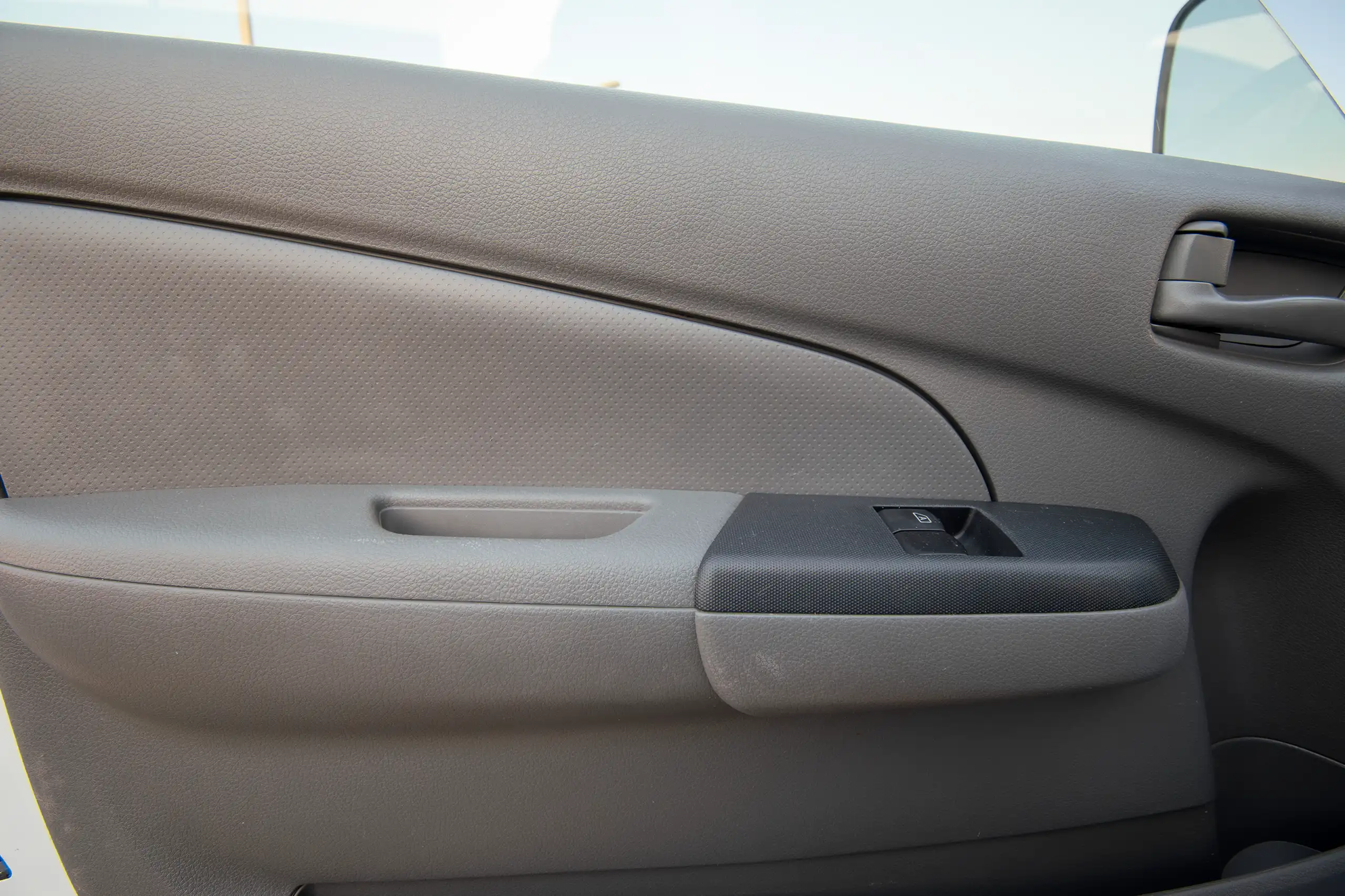 Used 2022 Nissan Urvan Standard Roof Chiller White – Driver Door Panel Full View at First Choice Cars Sharjah