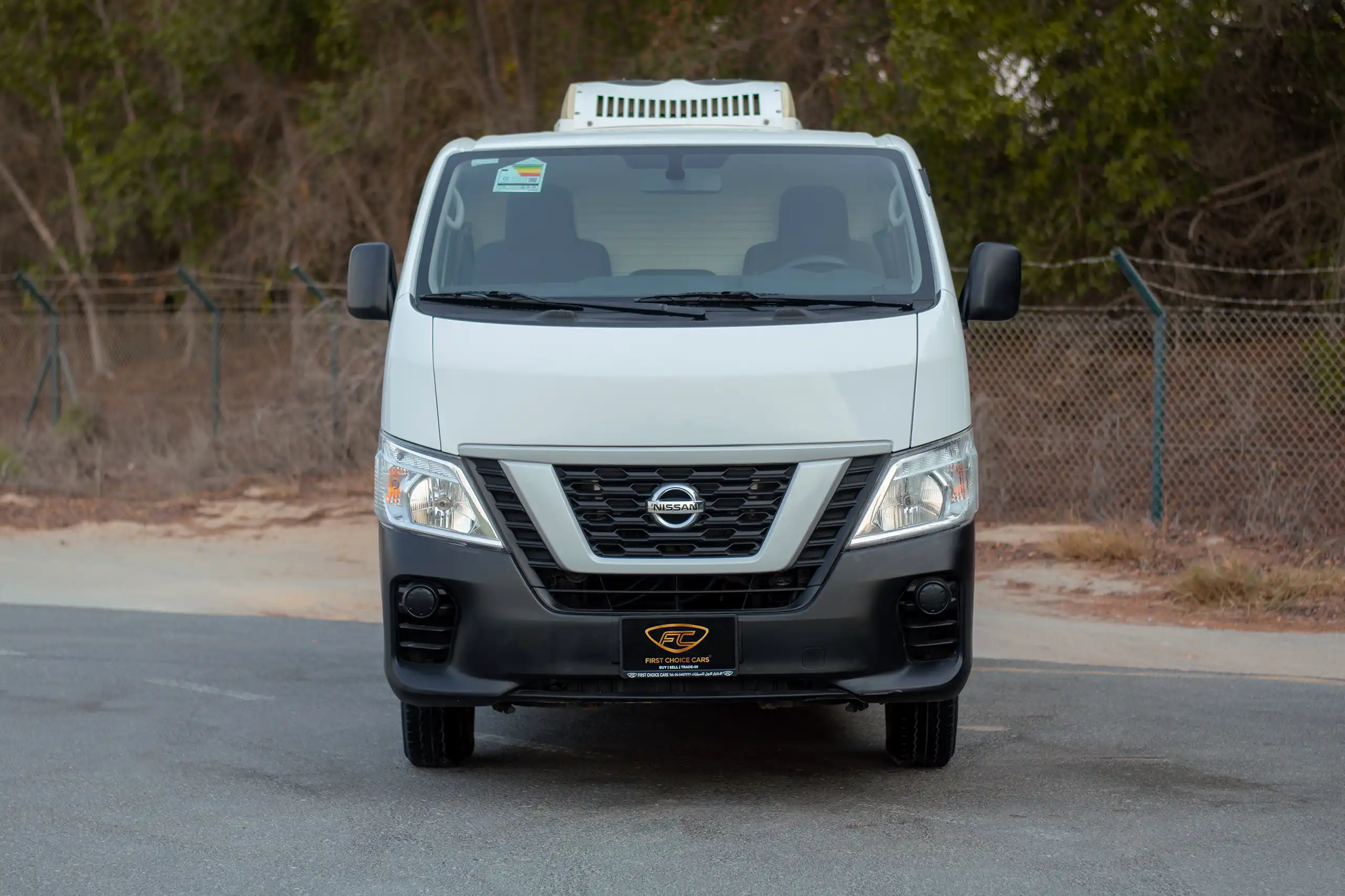 Used 2022 Nissan Urvan Standard Roof Chiller White – Front View at First Choice Cars Sharjah