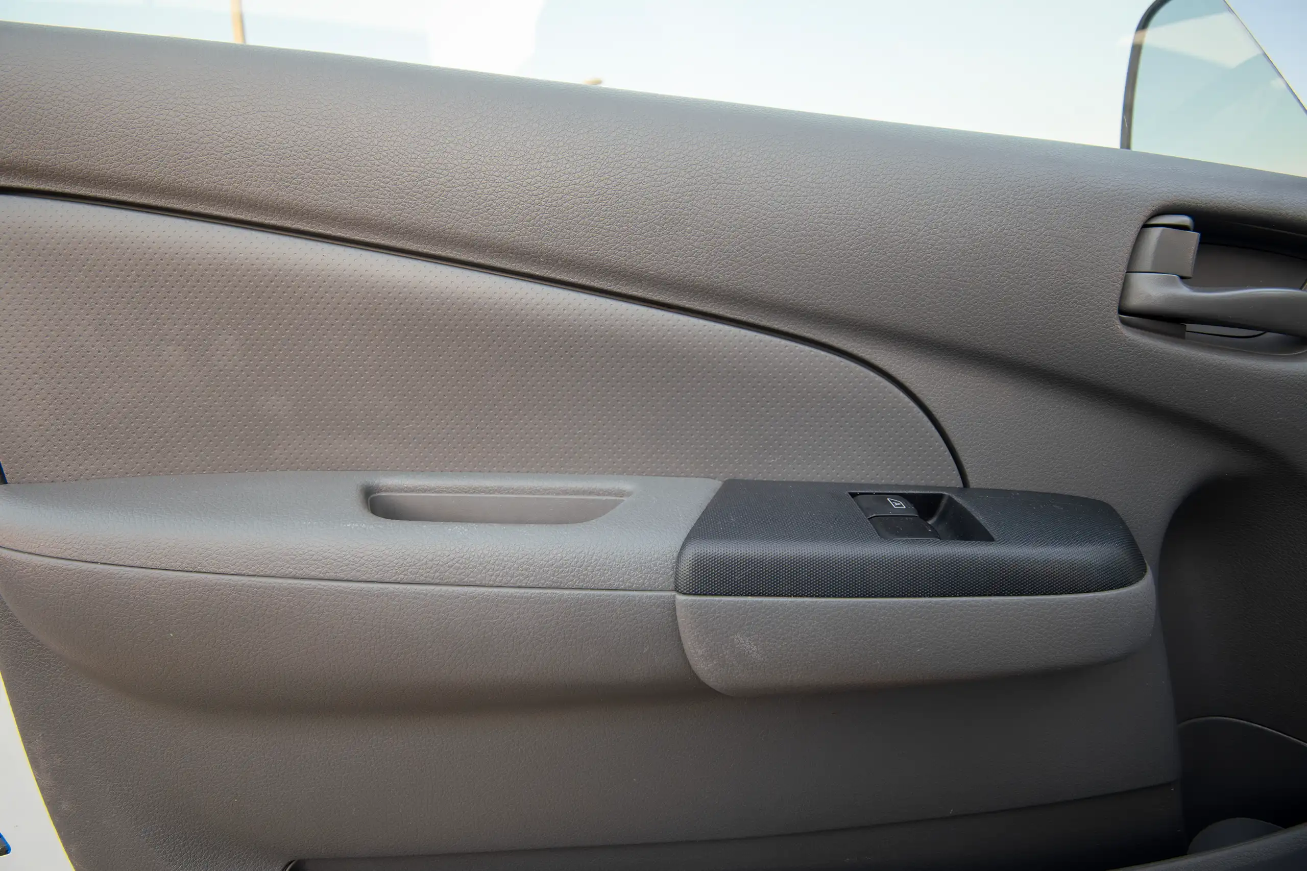 Used 2022 Nissan Urvan Standard Roof Chiller White – Driver Door Panel Full View at First Choice Cars Sharjah