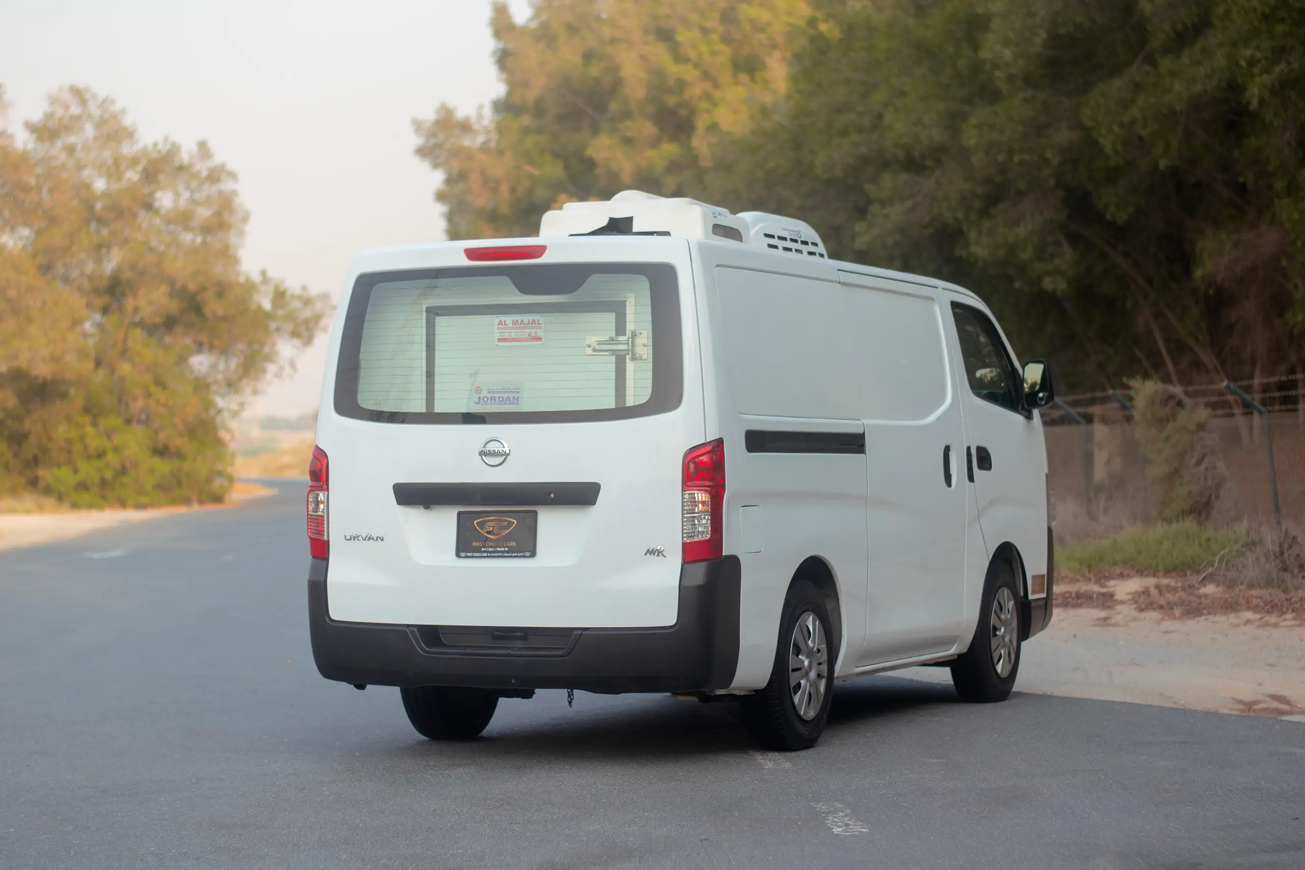 Used 2022 Nissan Urvan Standard Roof Chiller White – Right Back Diagonal (45°) View at First Choice Cars Sharjah