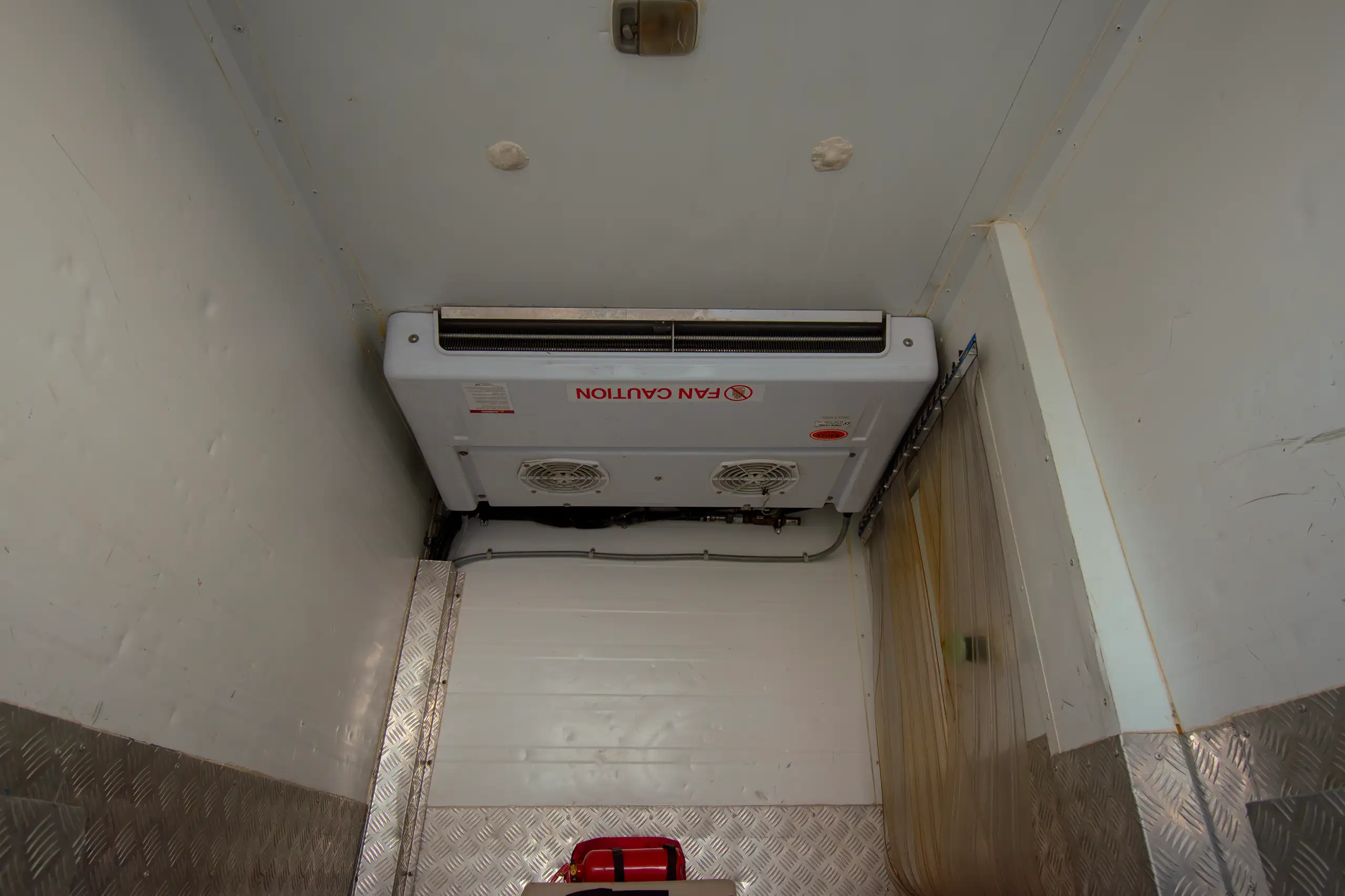 Used 2022 Nissan Urvan Standard Roof Chiller White – Freezer Cooling Unit View at First Choice Cars Sharjah