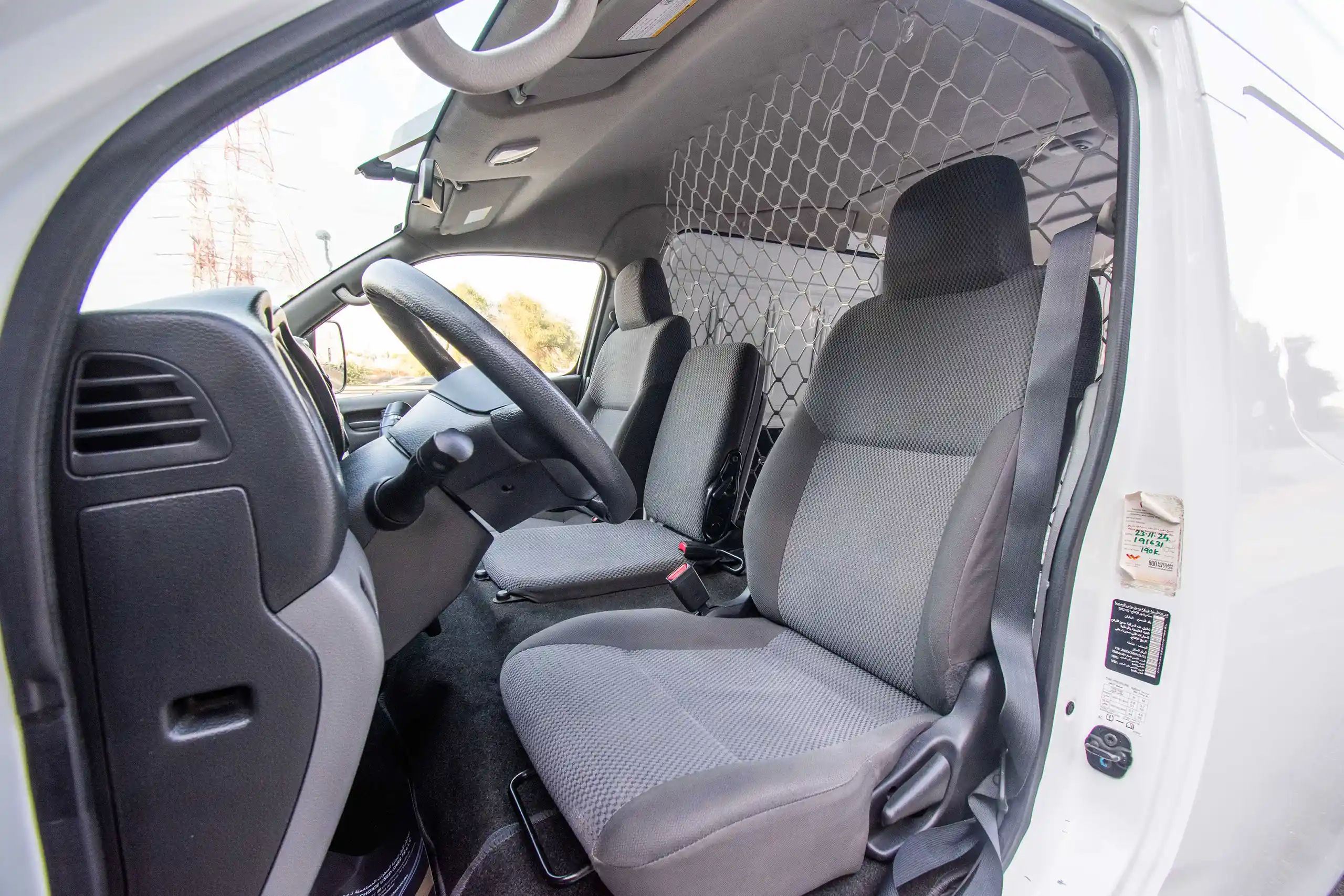 Used 2022 Nissan Urvan Panel Van H/R White – Front Driver Side Cabin View at First Choice Cars Sharjah