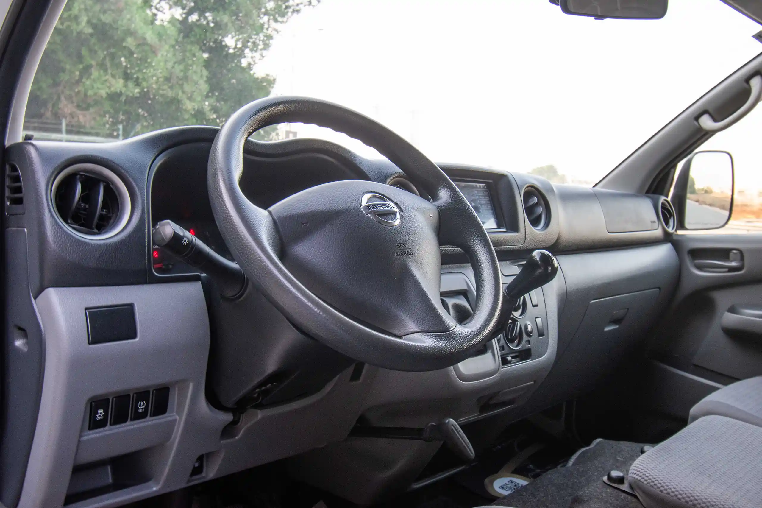 Used 2022 Nissan Urvan Panel Van H/R White – Driver Side Dashboard & Steering View at First Choice Cars Sharjah