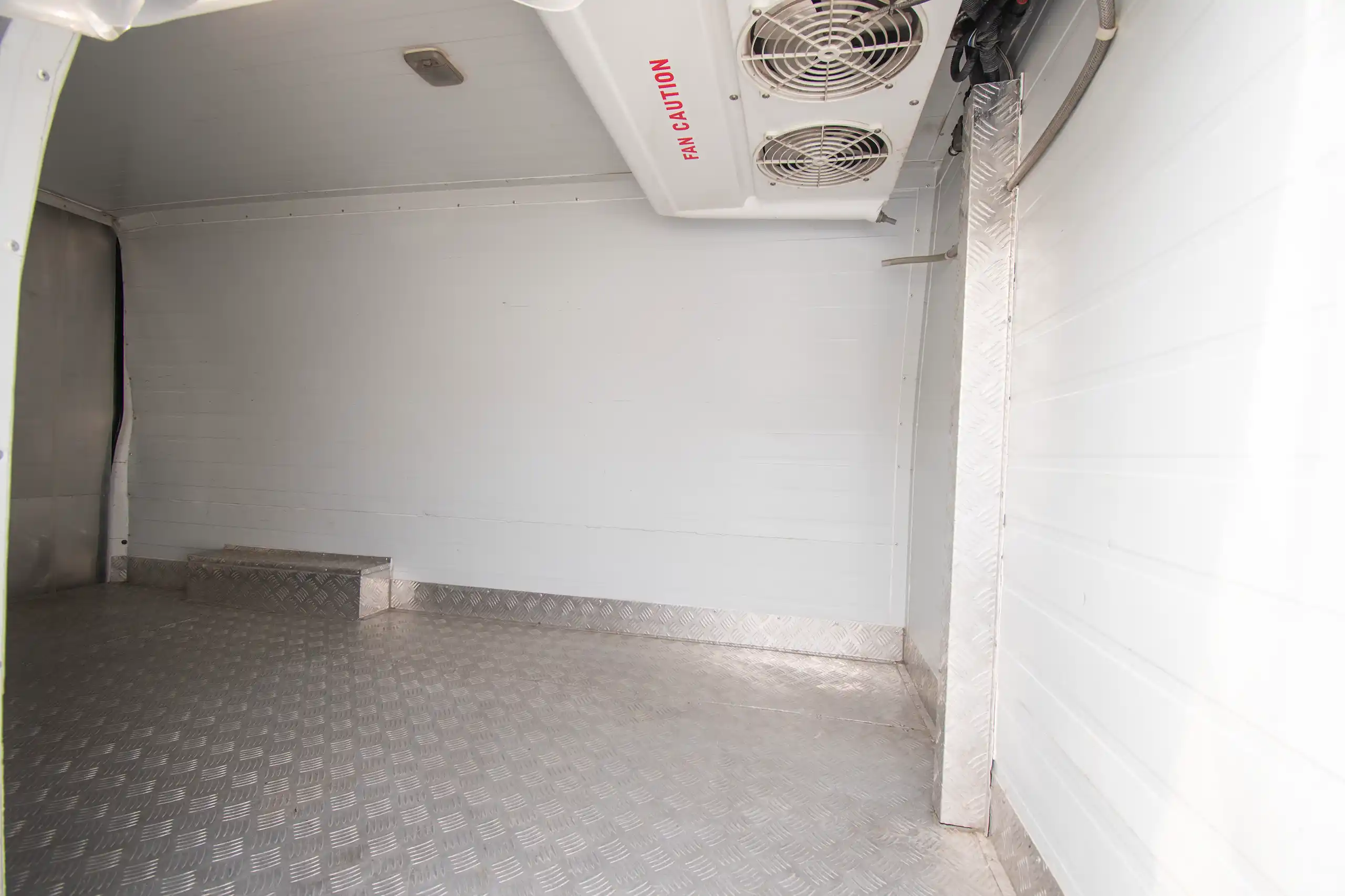 Used 2022 Nissan Urvan High Roof Chiller White – Chiller Box Right Side Interior View at First Choice Cars Sharjah