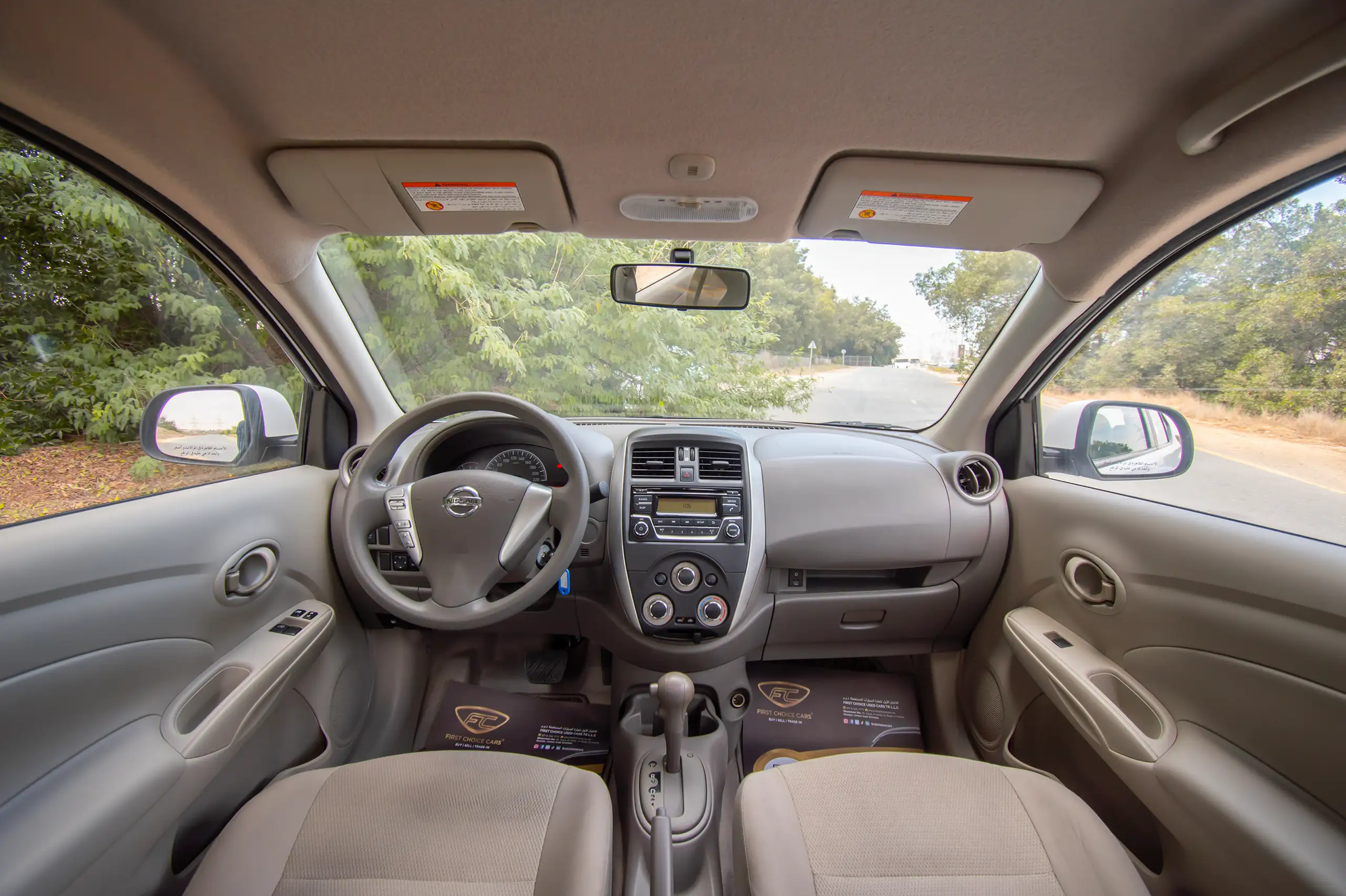 Used 2022 Nissan Sunny SV White – Front Cabin / Dashboard Full View at First Choice Cars Sharjah
