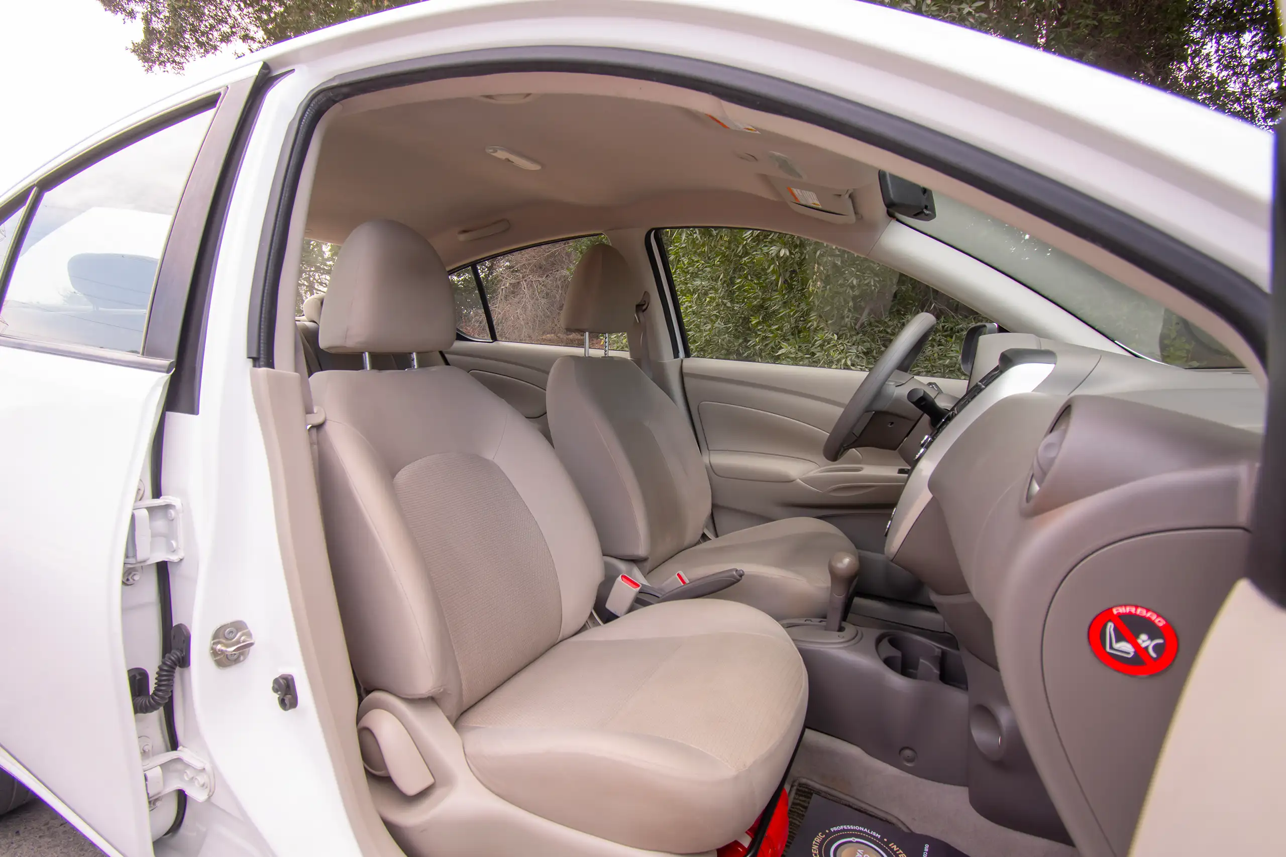 Used 2022 Nissan Sunny SV White – Front Passenger Side Cabin View at First Choice Cars Sharjah