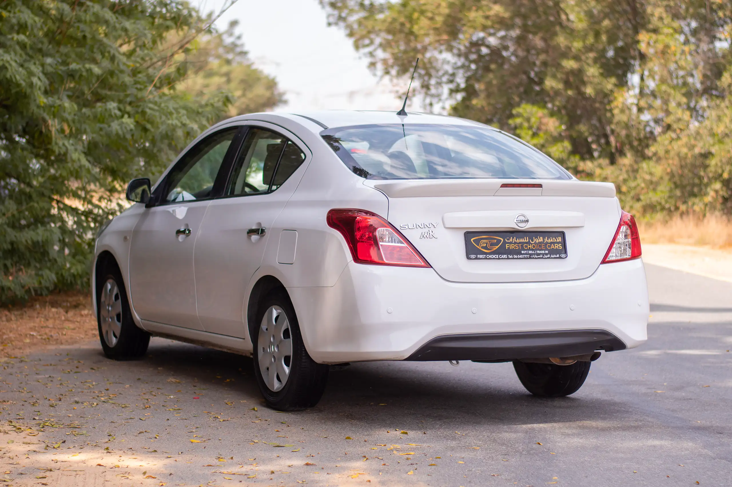 Used 2022 Nissan Sunny SV White – Left Back Diagonal (45°) View at First Choice Cars Sharjah