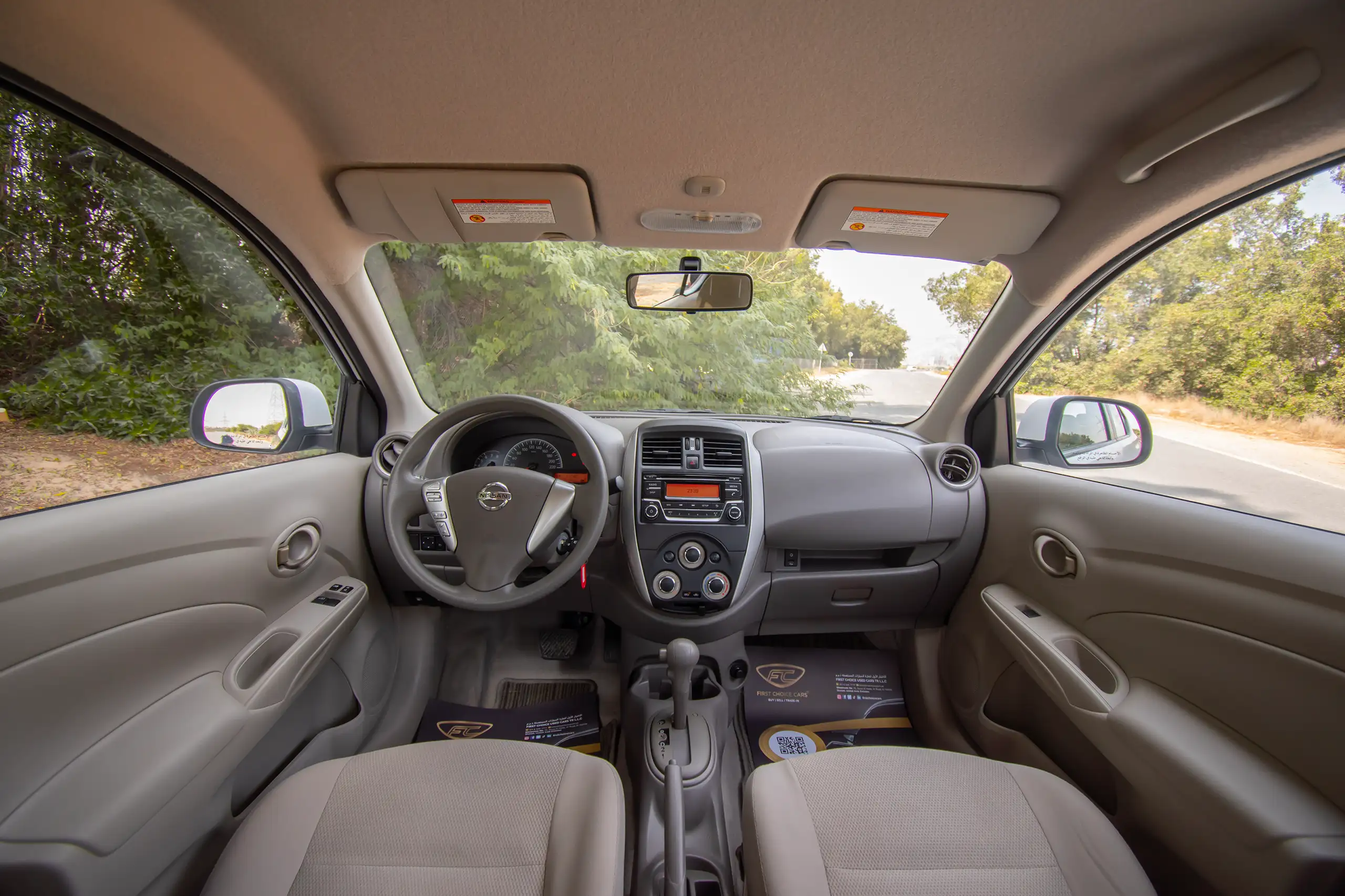 Used 2022 Nissan Sunny SV White – Front Cabin / Dashboard Full View at First Choice Cars Sharjah